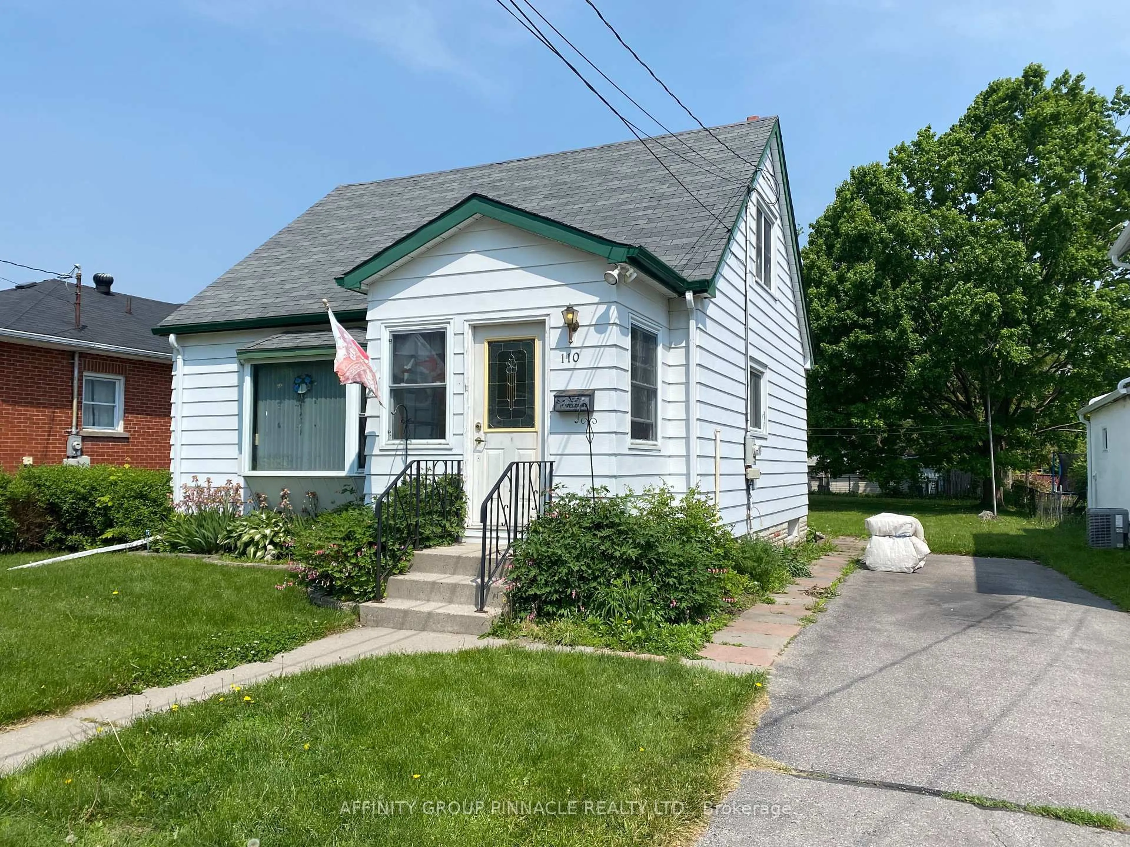 Home with vinyl exterior material, street for 110 Regent St, Kawartha Lakes Ontario K9V 3V4