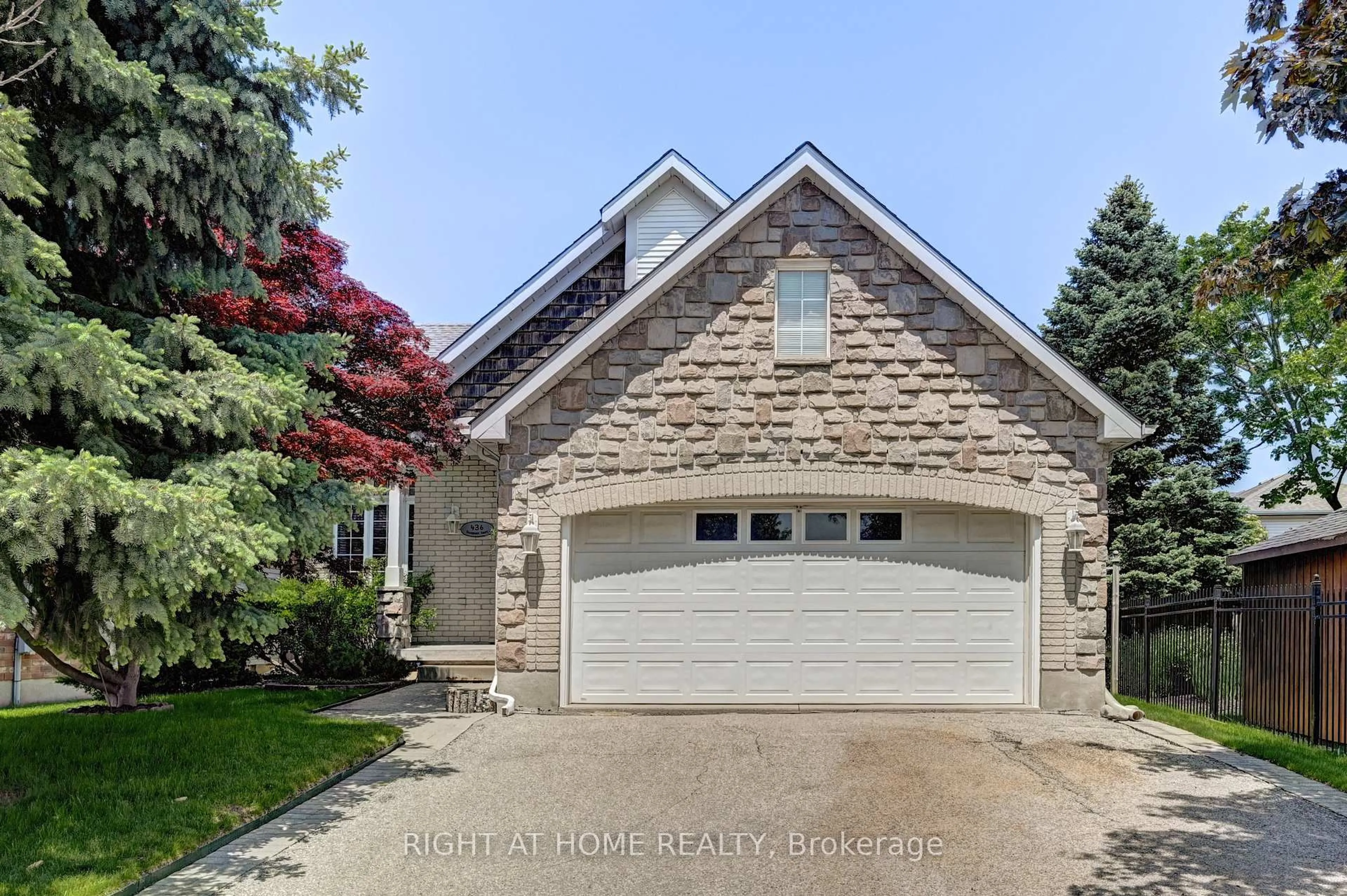 Home with brick exterior material, street for 436 Dansbury Dr, Waterloo Ontario N2K 3X9