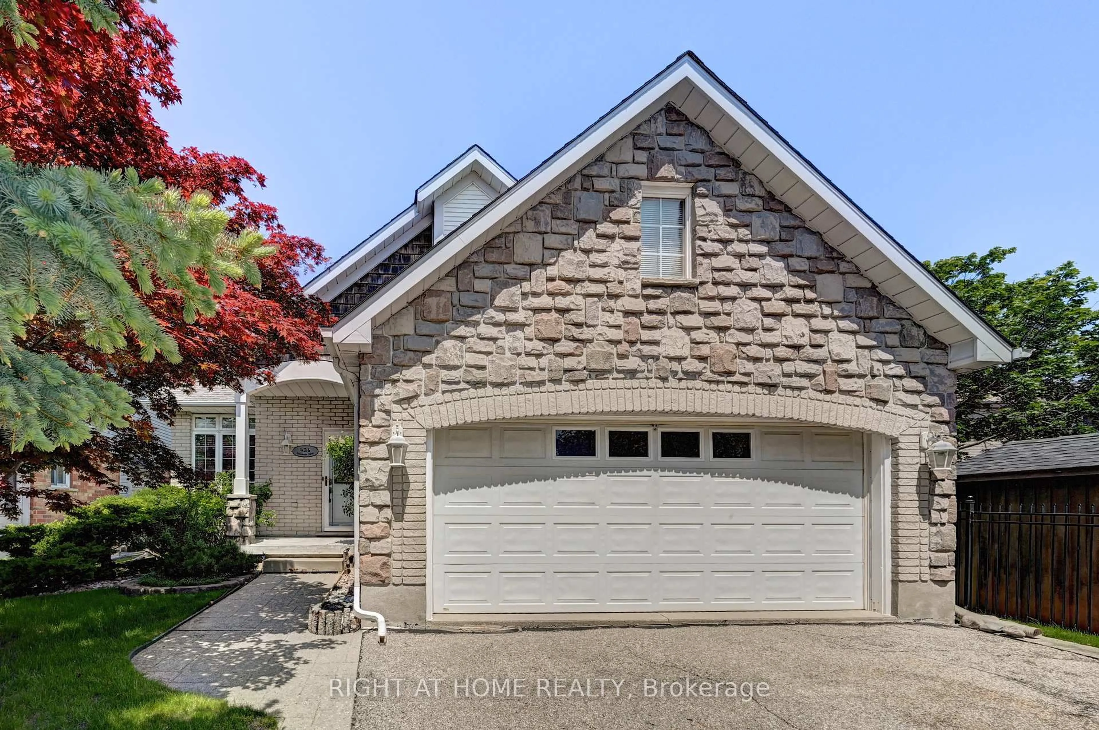 Home with brick exterior material, street for 436 Dansbury Dr, Waterloo Ontario N2K 3X9