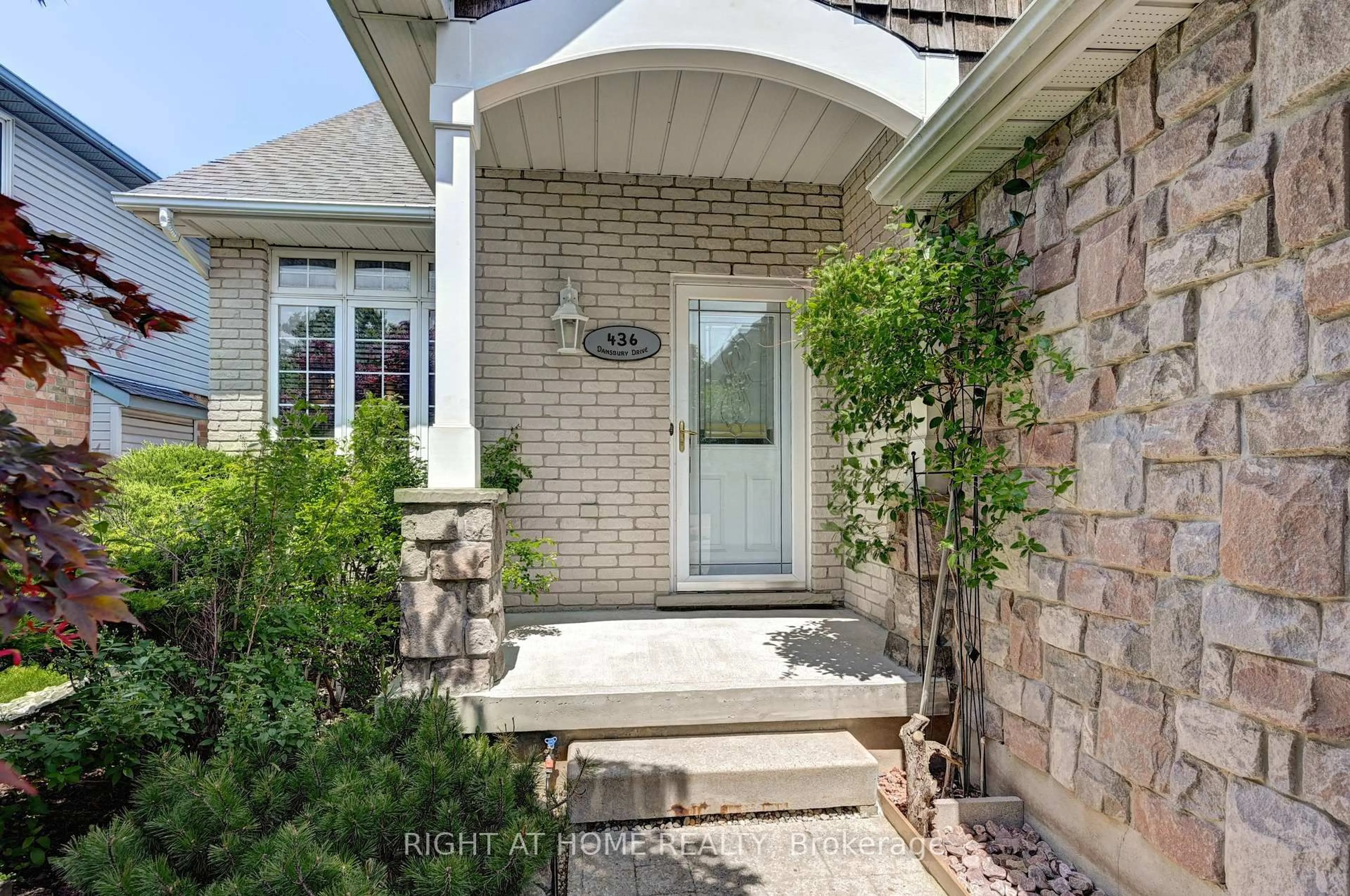 Home with brick exterior material, street for 436 Dansbury Dr, Waterloo Ontario N2K 3X9