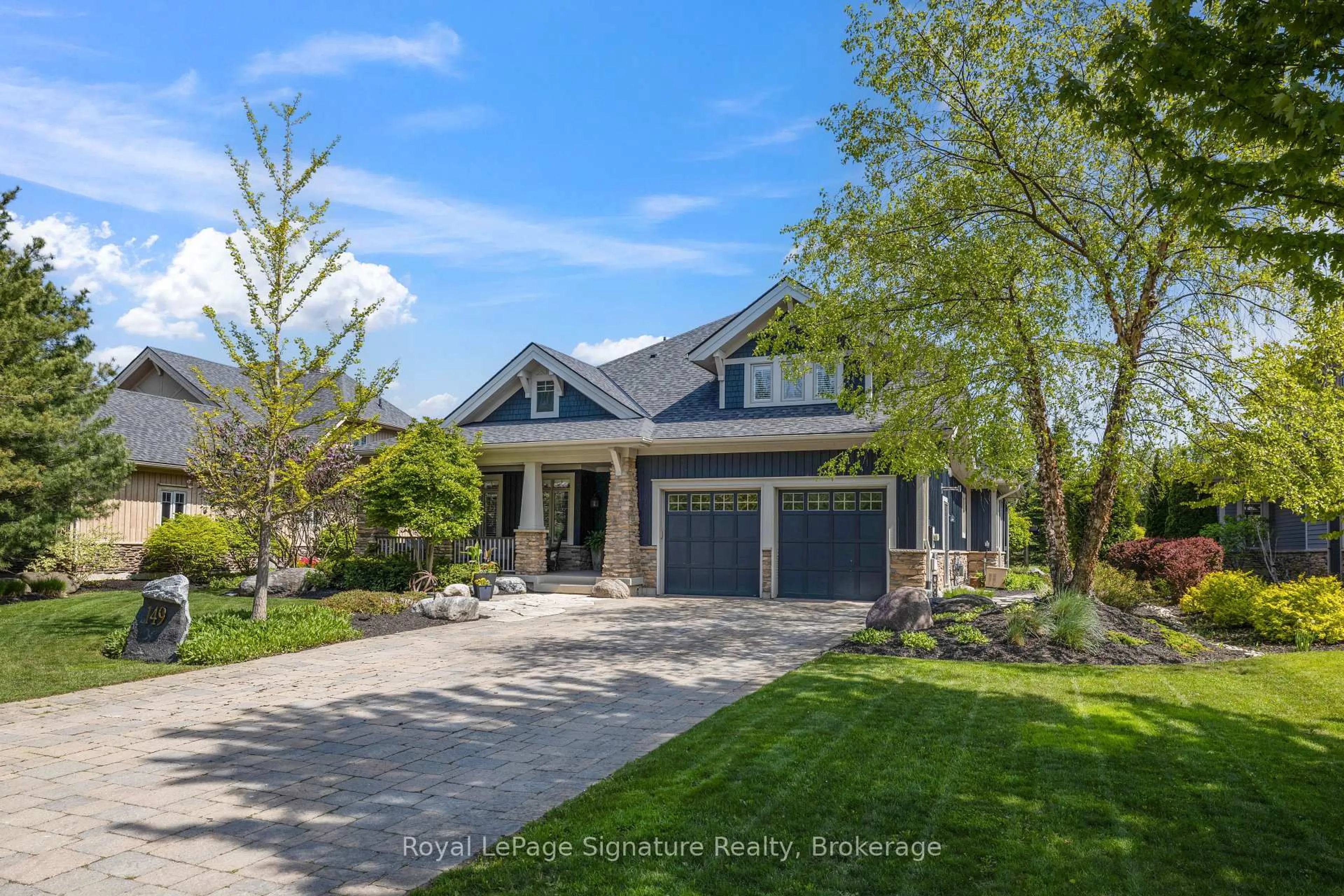 Home with brick exterior material, street for 149 East Ridge Dr, Blue Mountains Ontario N0H 2P0
