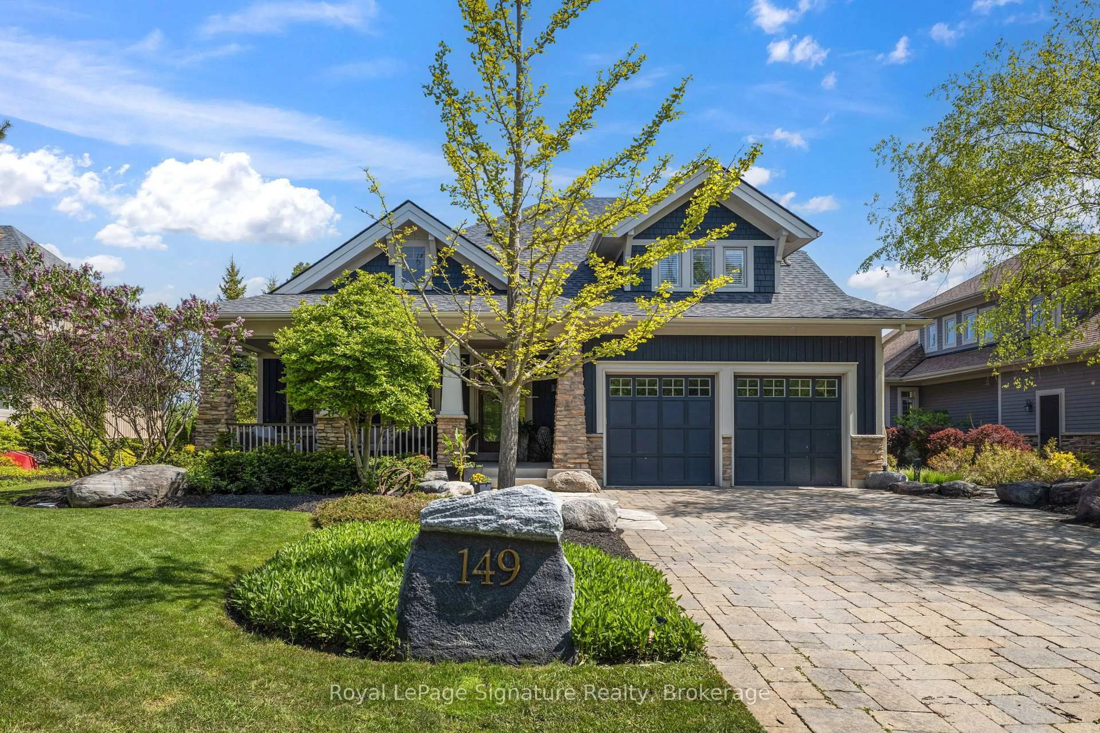 Home with brick exterior material, street for 149 East Ridge Dr, Blue Mountains Ontario N0H 2P0