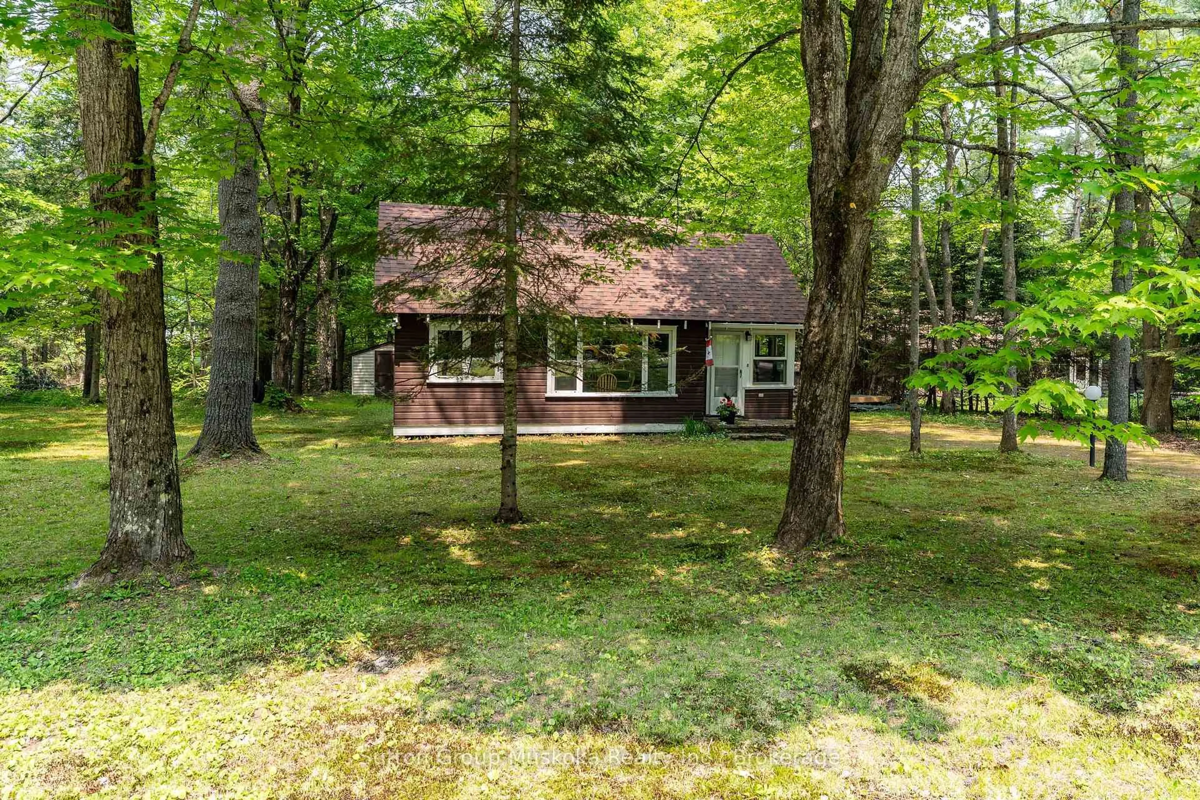 A pic from outside/outdoor area/front of a property/back of a property/a pic from drone, forest/trees view for 86 & 92 Hoths Lane, Huntsville Ontario P0B 1L0