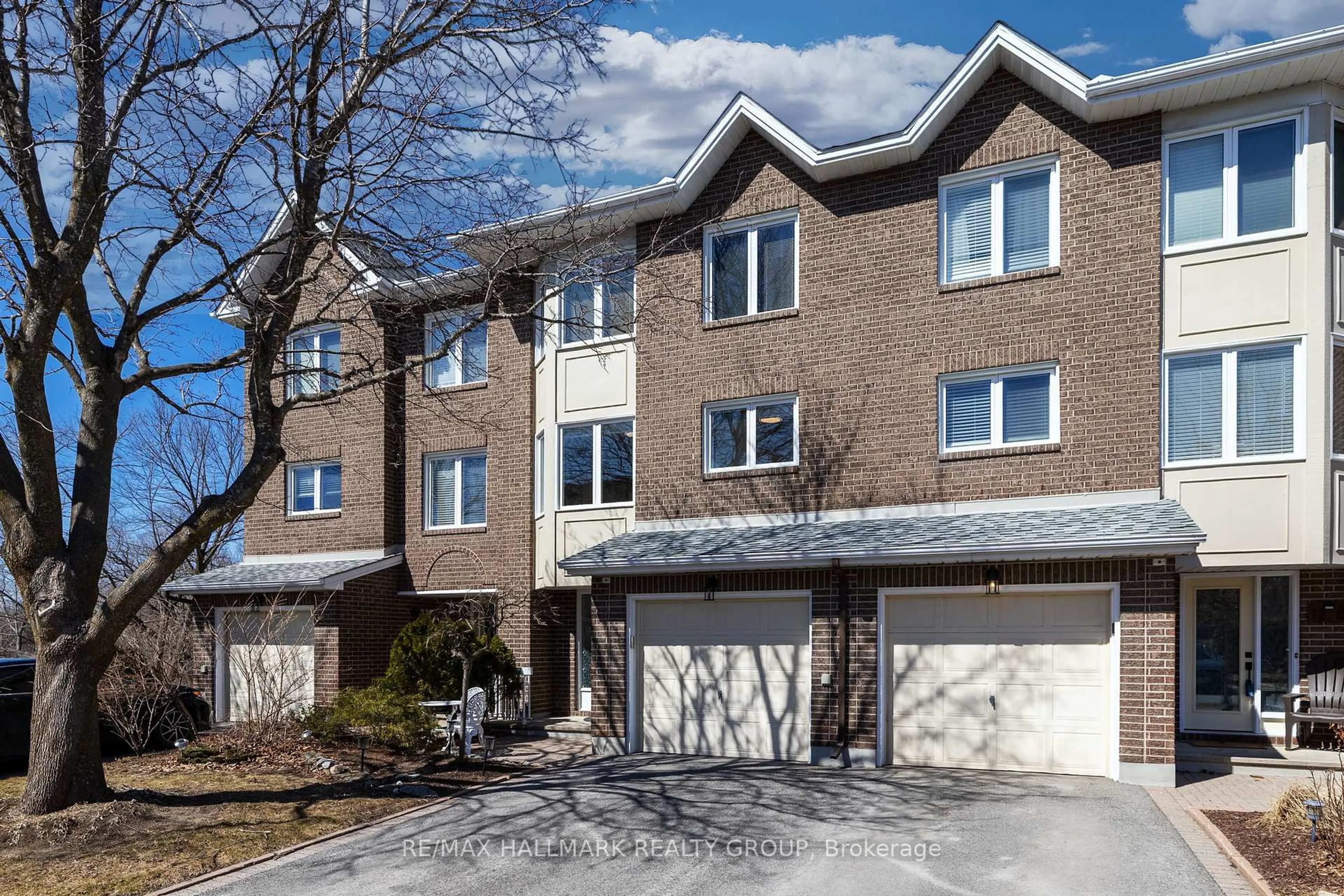 Home with brick exterior material, street for 12C Maple Ridge Cres, Ottawa Ontario K2J 3L6