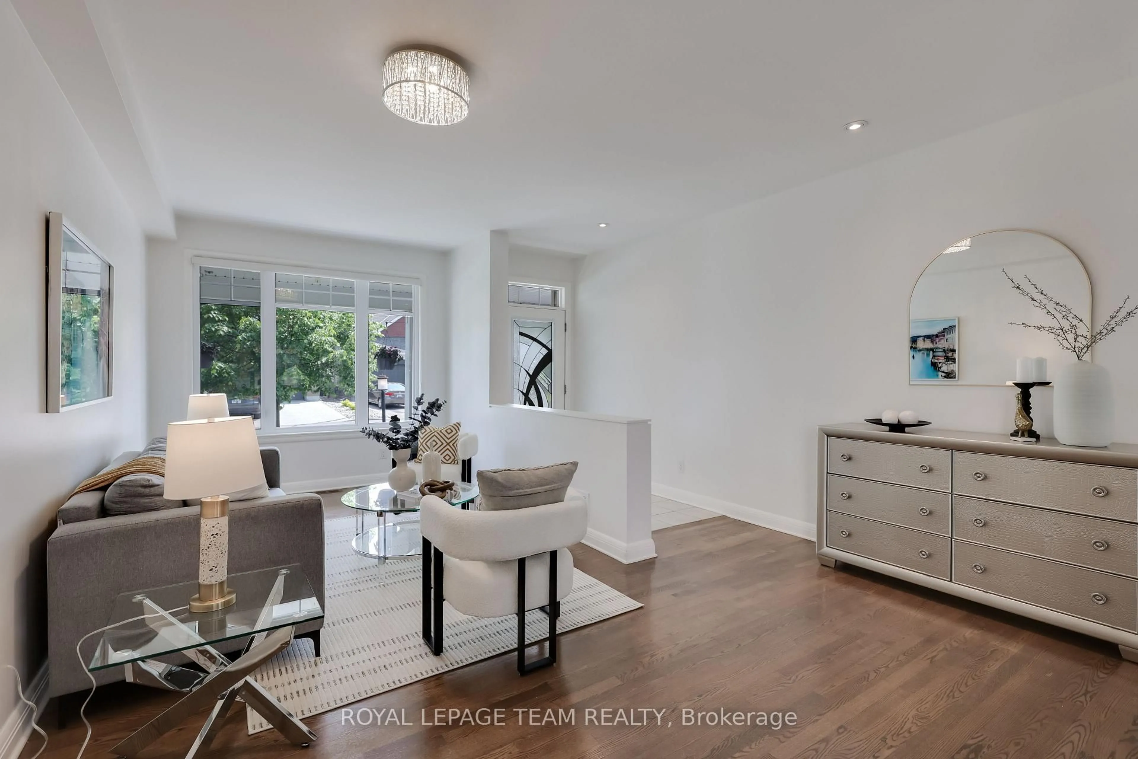 Living room with furniture, wood/laminate floor for 193 GRAINSTONE Way, Kanata Ontario K2T 0H2