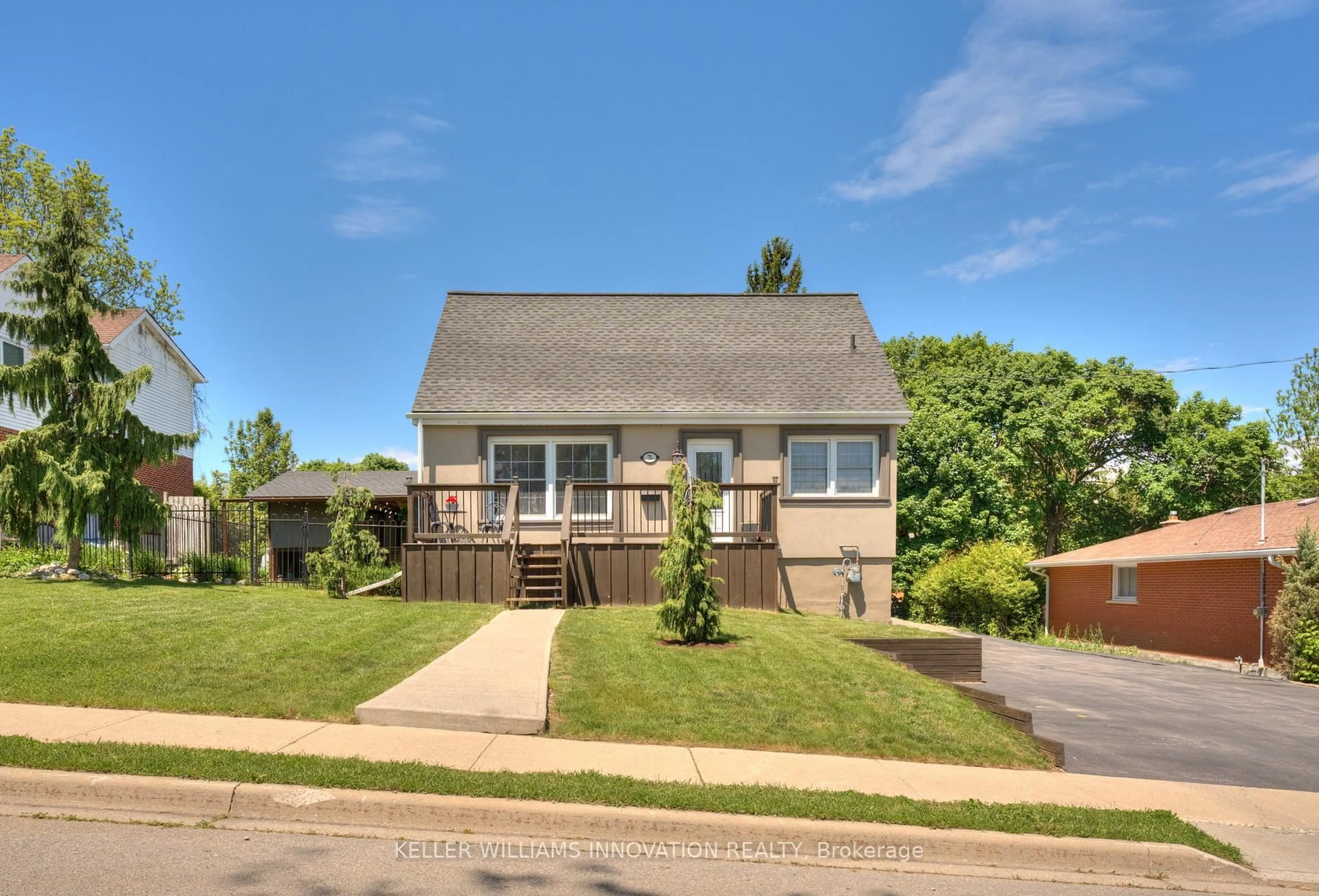 Home with vinyl exterior material, street for 70 Stanley St, Cambridge Ontario N1S 2A6