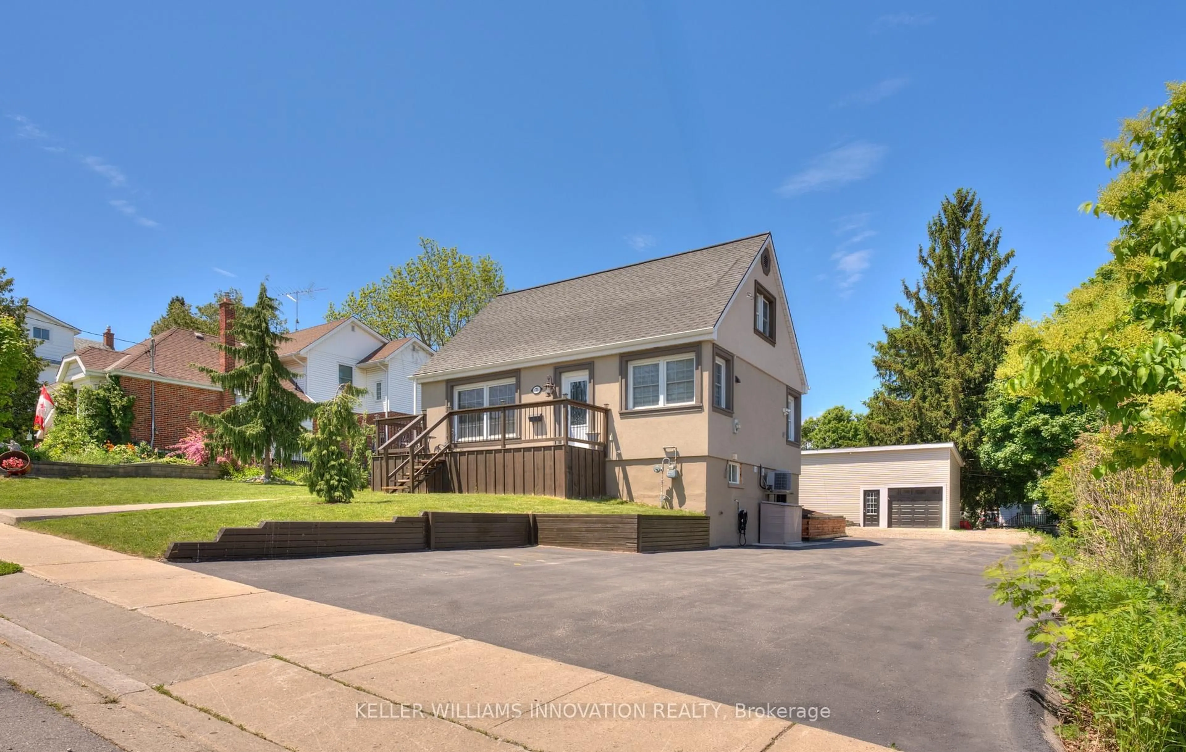 Home with vinyl exterior material, street for 70 Stanley St, Cambridge Ontario N1S 2A6