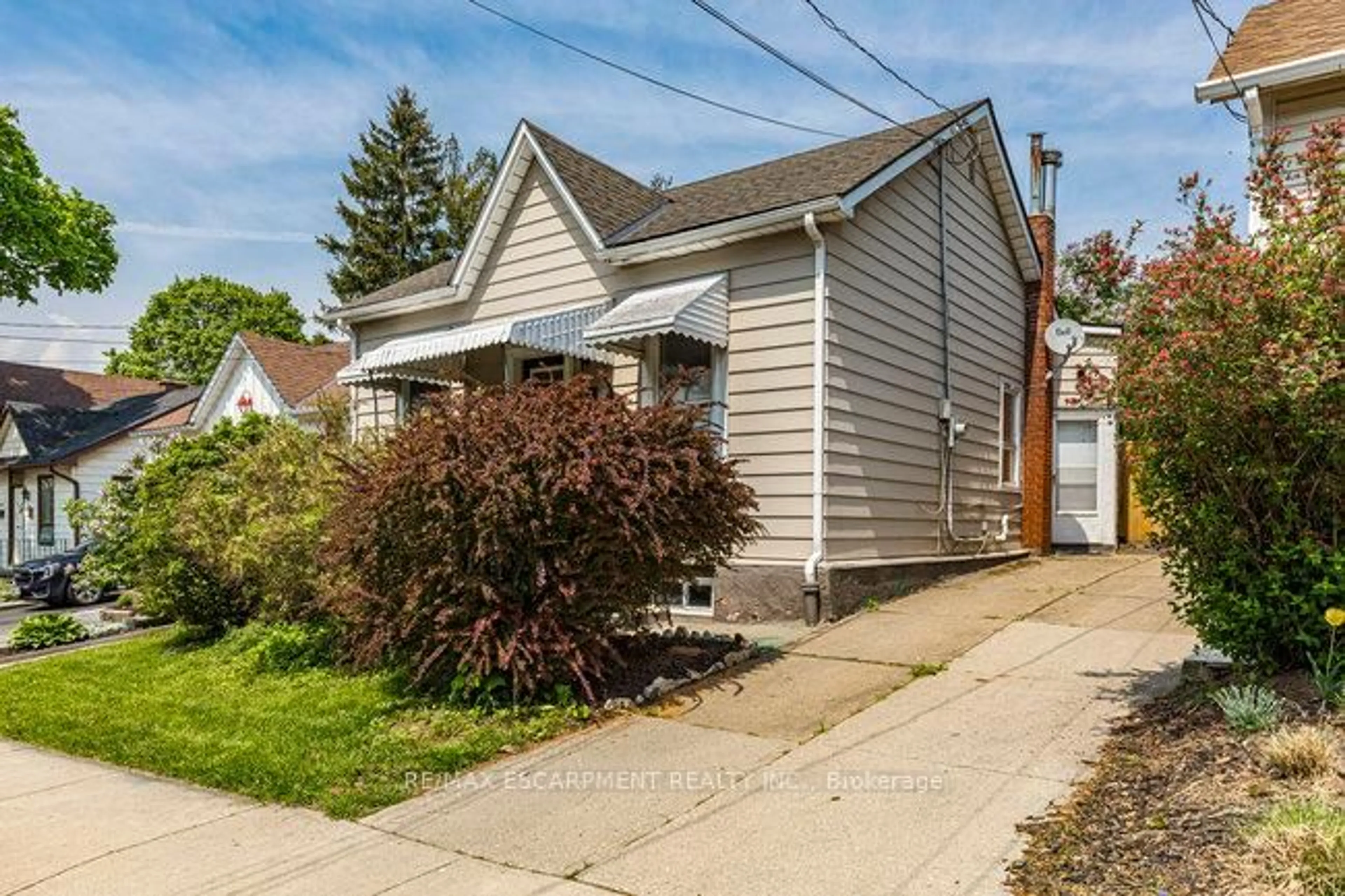 Home with vinyl exterior material, street for 12 Lochearne St, Hamilton Ontario L8R 1V8