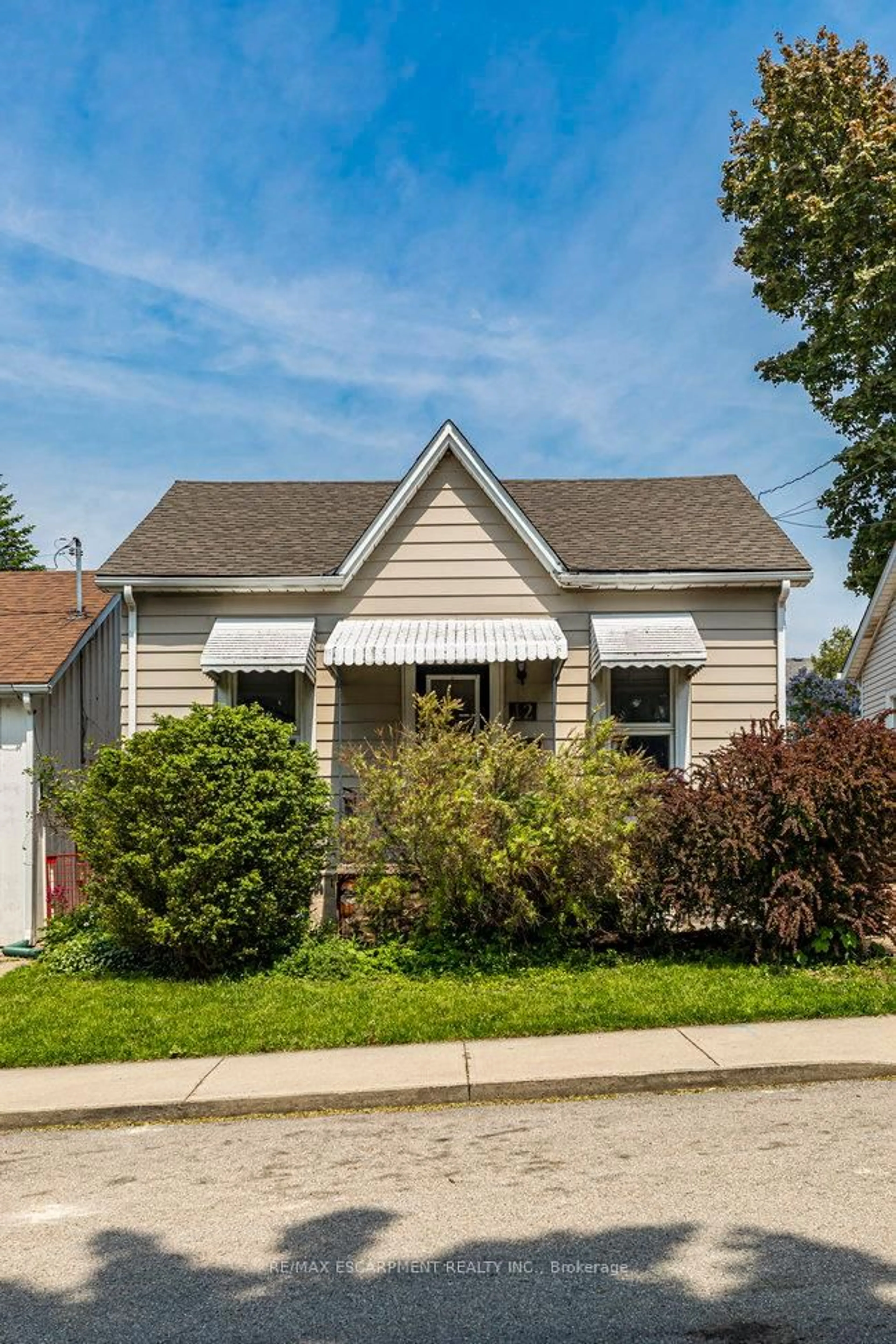Home with vinyl exterior material, street for 12 Lochearne St, Hamilton Ontario L8R 1V8