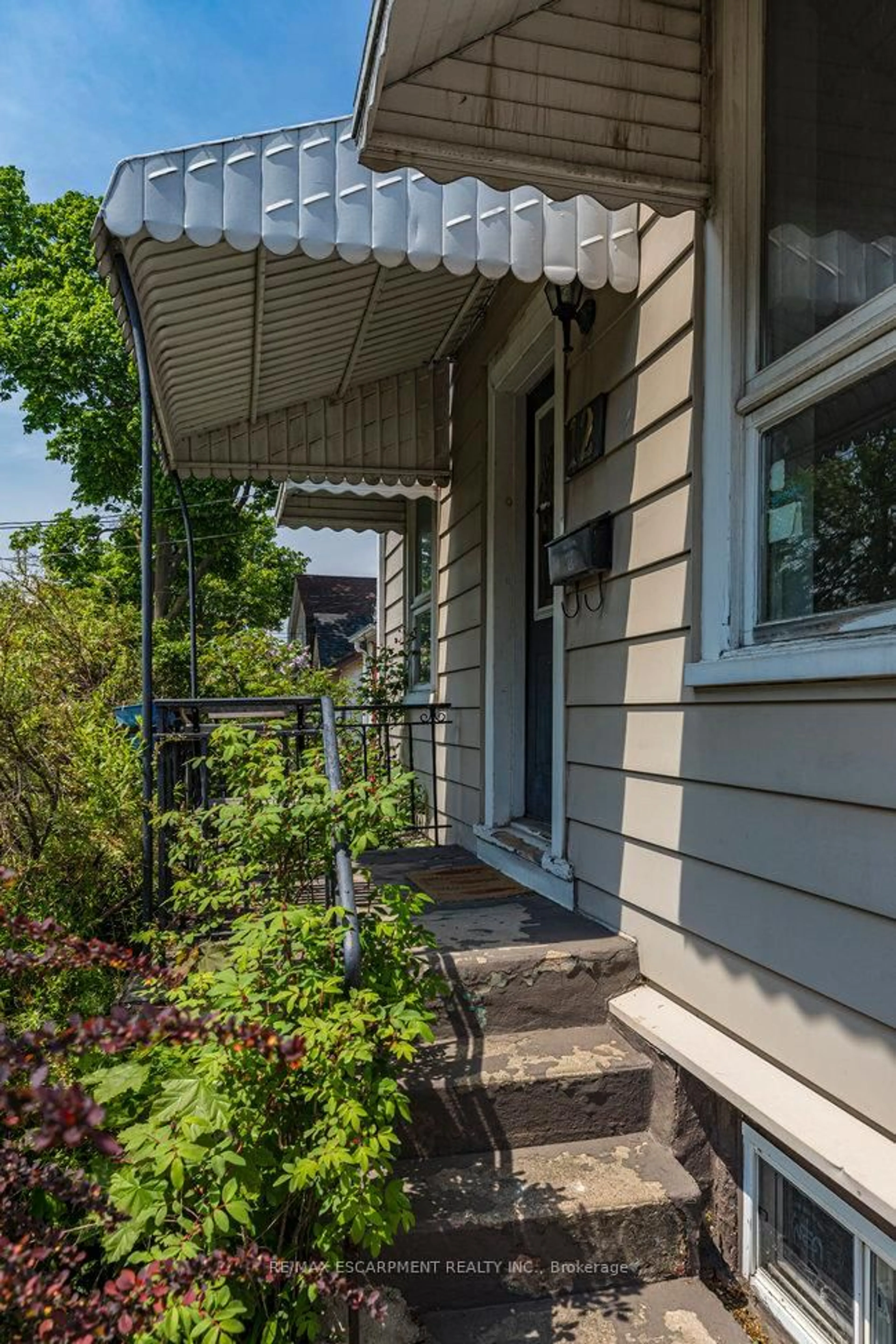 Home with vinyl exterior material, street for 12 Lochearne St, Hamilton Ontario L8R 1V8