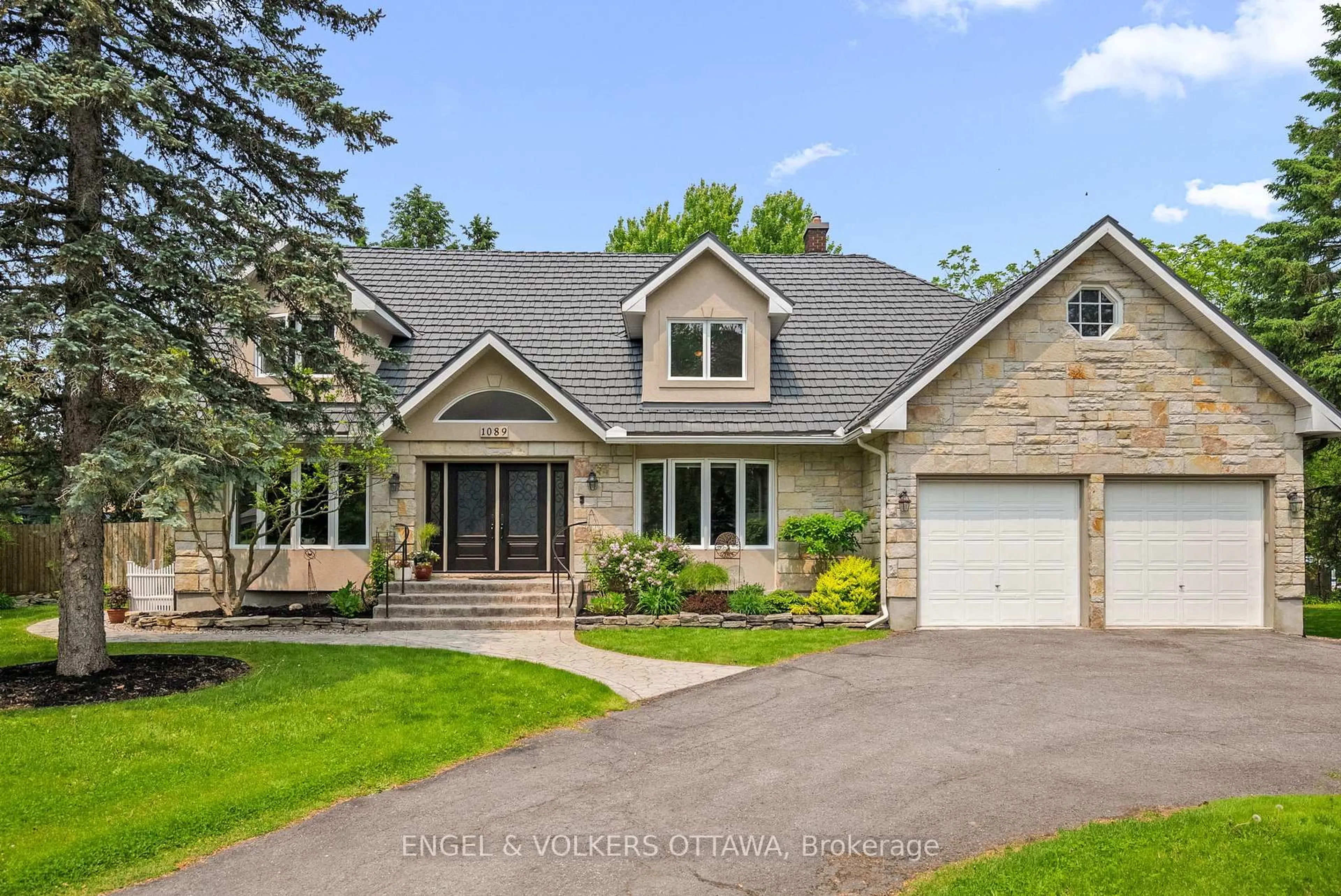 Home with brick exterior material, street for 1089 Island View Dr, Manotick Ontario K4M 1J8