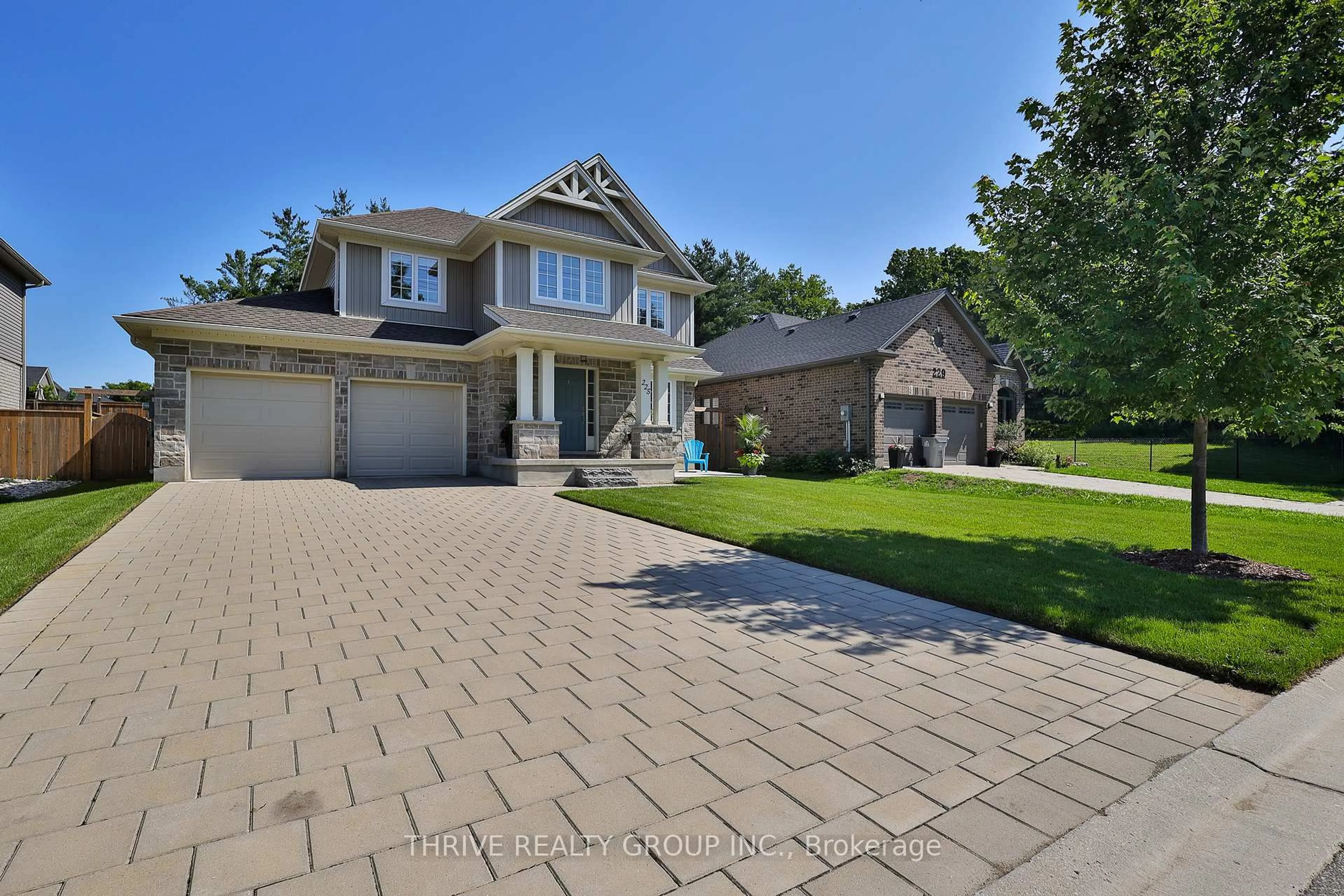 Home with brick exterior material, street for 225 Norman Pl, Strathroy-Caradoc Ontario N7G 0E6
