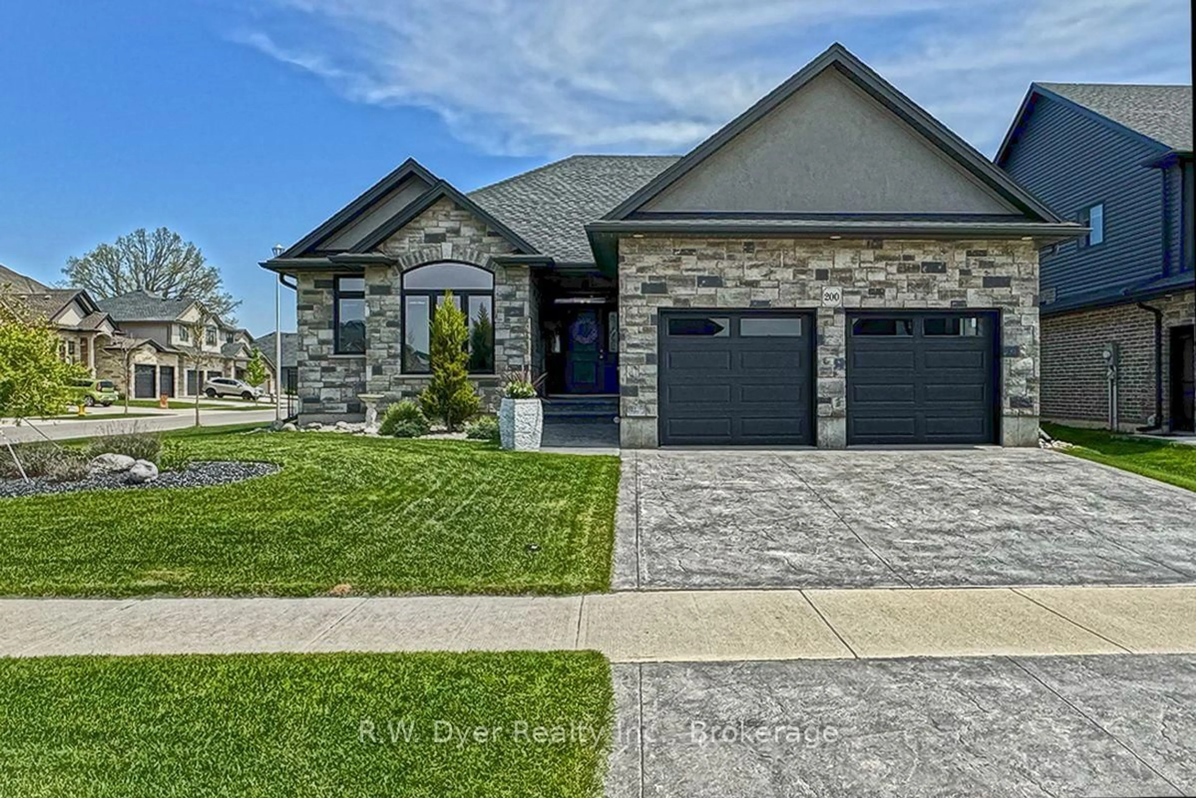 Home with brick exterior material, street for 200 Juniper St, Woodstock Ontario N4S 0E1