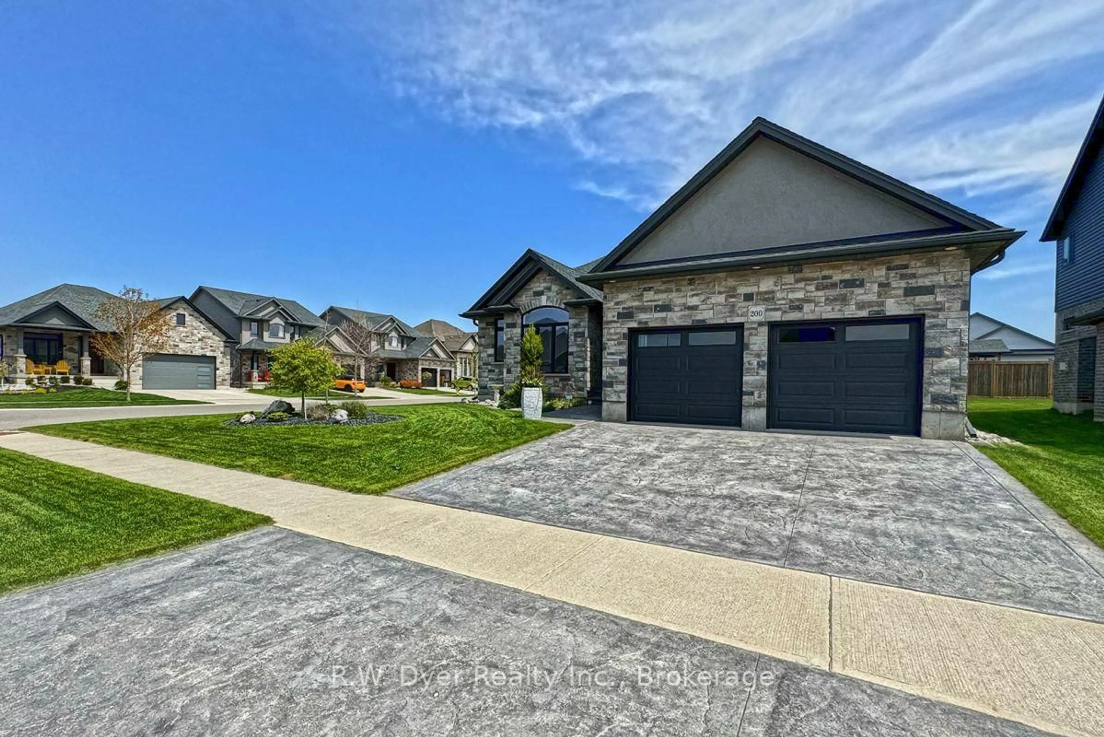 Home with brick exterior material, street for 200 Juniper St, Woodstock Ontario N4S 0E1