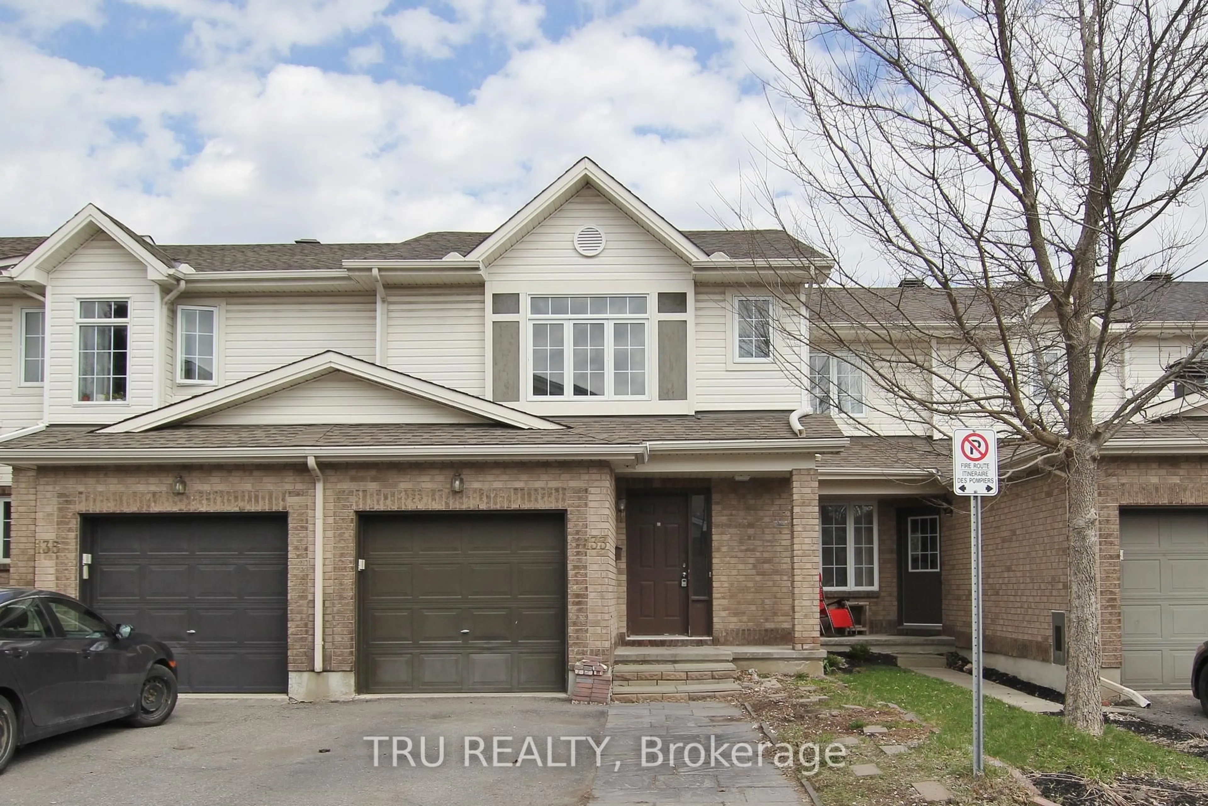 Home with brick exterior material, street for 133 Kinross Private, Ottawa Ontario K2K 3P9