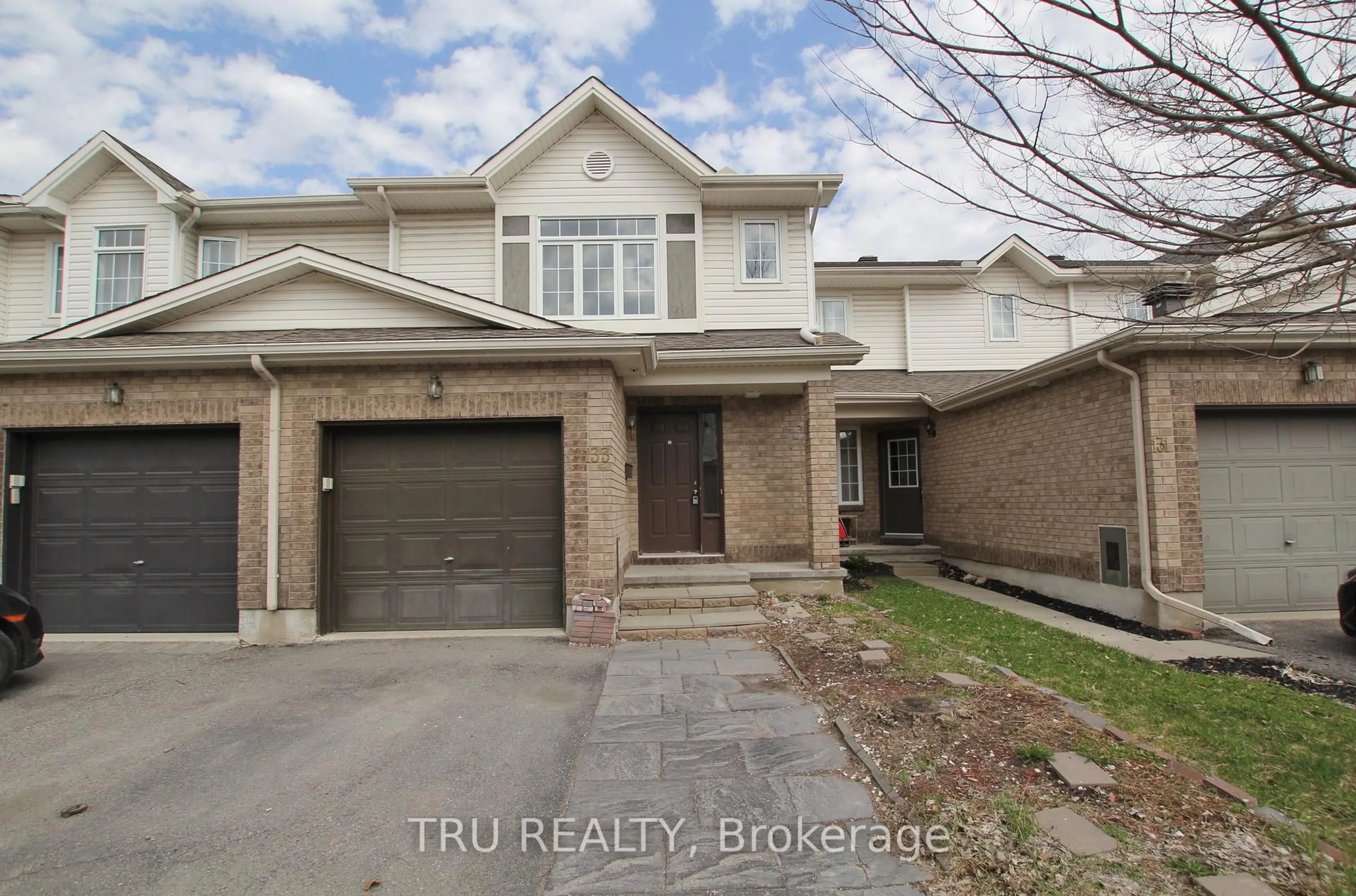Home with brick exterior material, street for 133 Kinross Private, Ottawa Ontario K2K 3P9