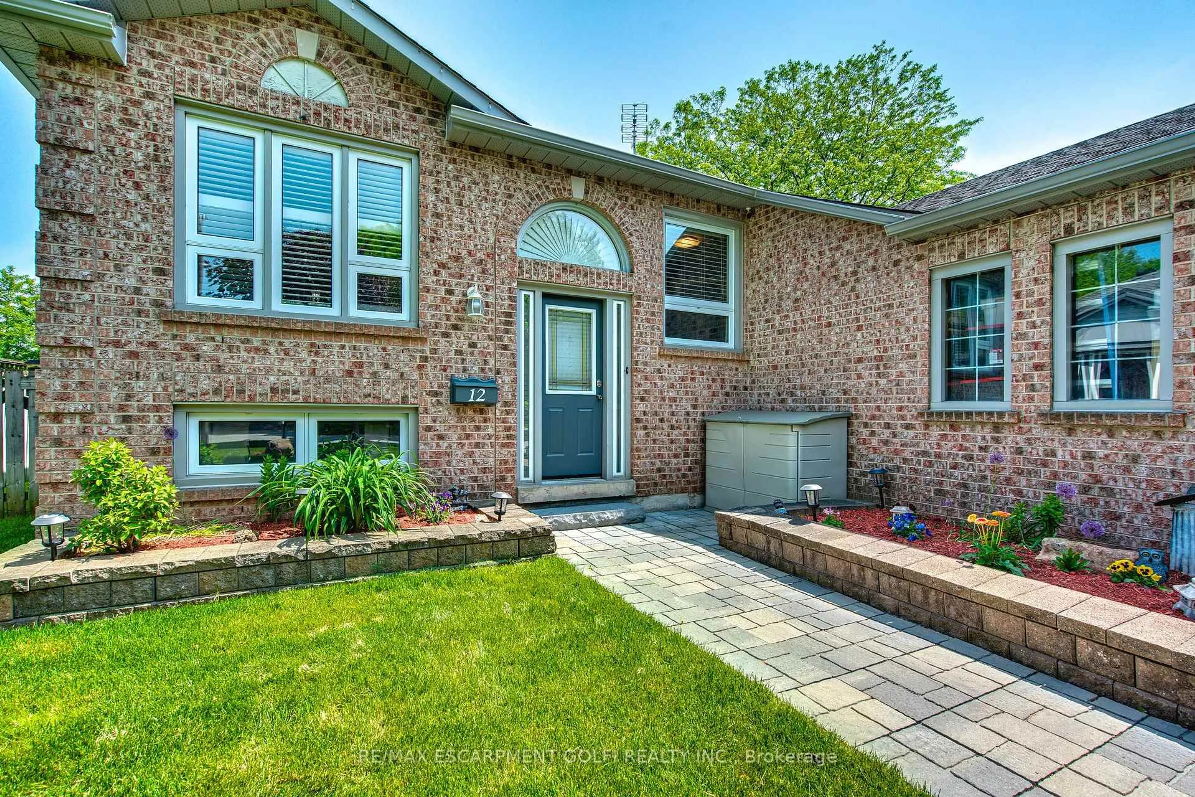 Home with brick exterior material, street for 12 Woodside Sq, Pelham Ontario L0S 1E4