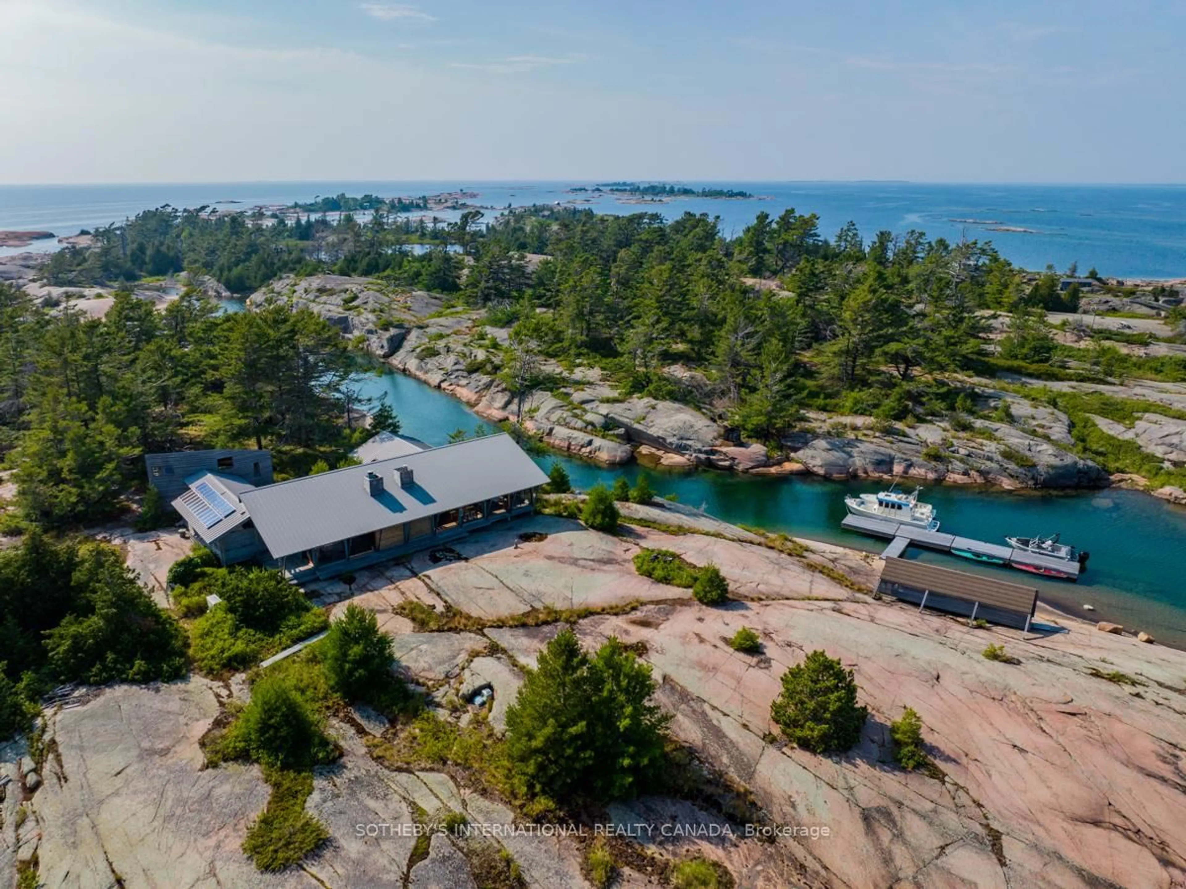 A pic from outside/outdoor area/front of a property/back of a property/a pic from drone, water/lake/river/ocean view for 2 Stalker, Carling Ontario P0G 1G0