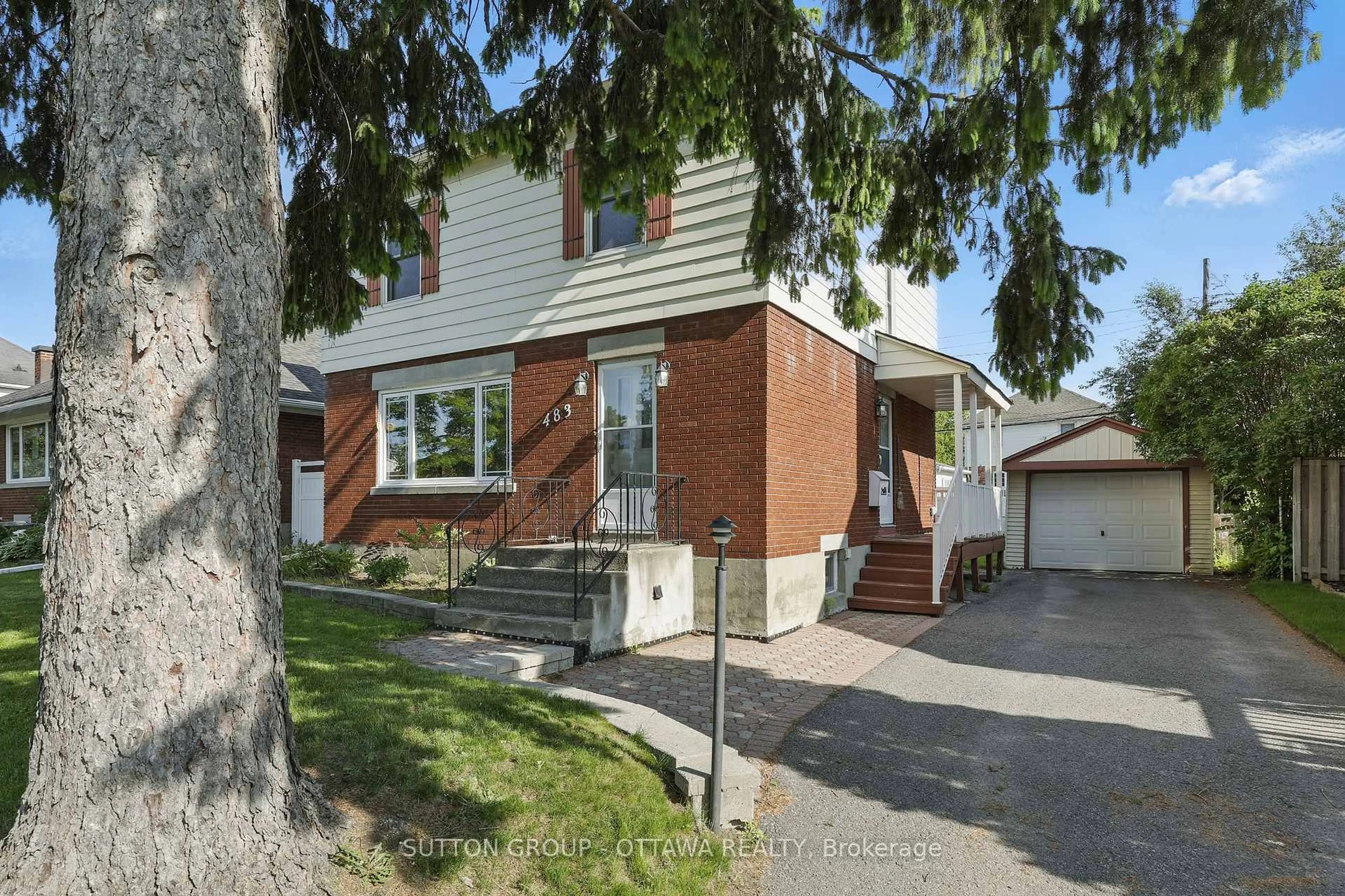 Home with brick exterior material, street for 483 Wolffdale Cres, Ottawa Ontario K1K 1N6
