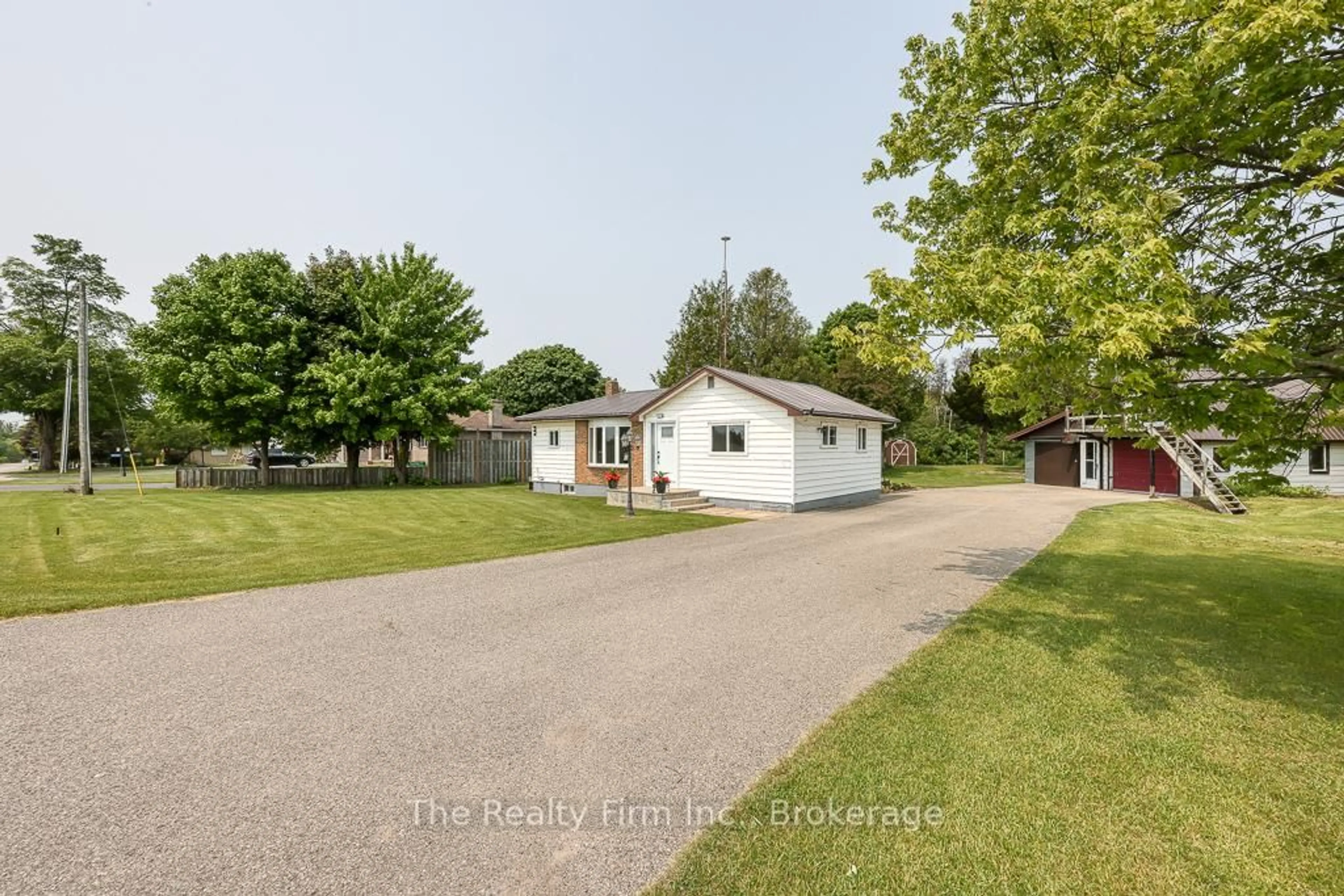 A pic from outside/outdoor area/front of a property/back of a property/a pic from drone, street for 185559 Cornell Rd, Norwich Ontario N0J 1R0