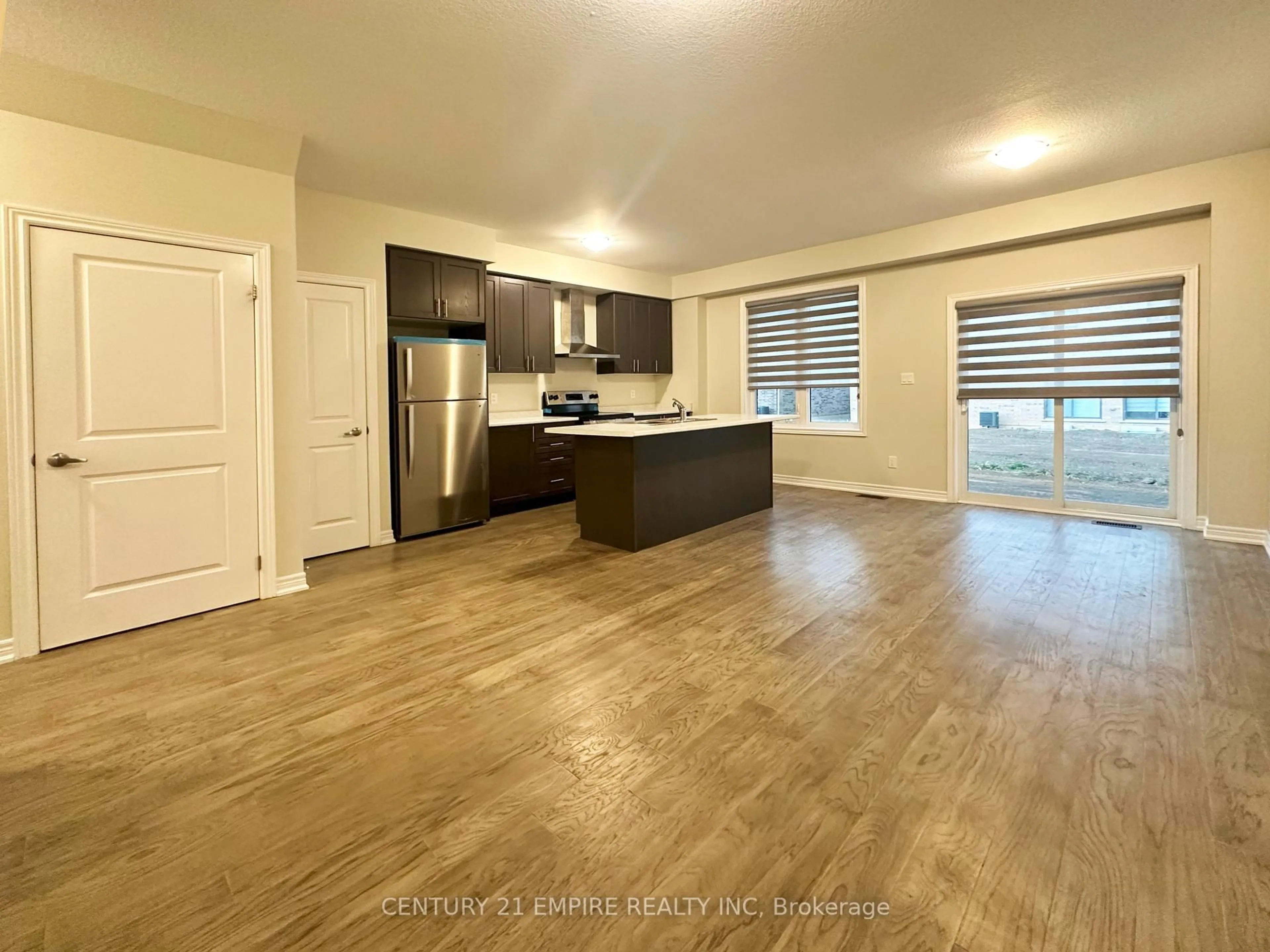 Open concept kitchen, wood/laminate floor for 11 Mia Dr, Hamilton Ontario L9B 1K2