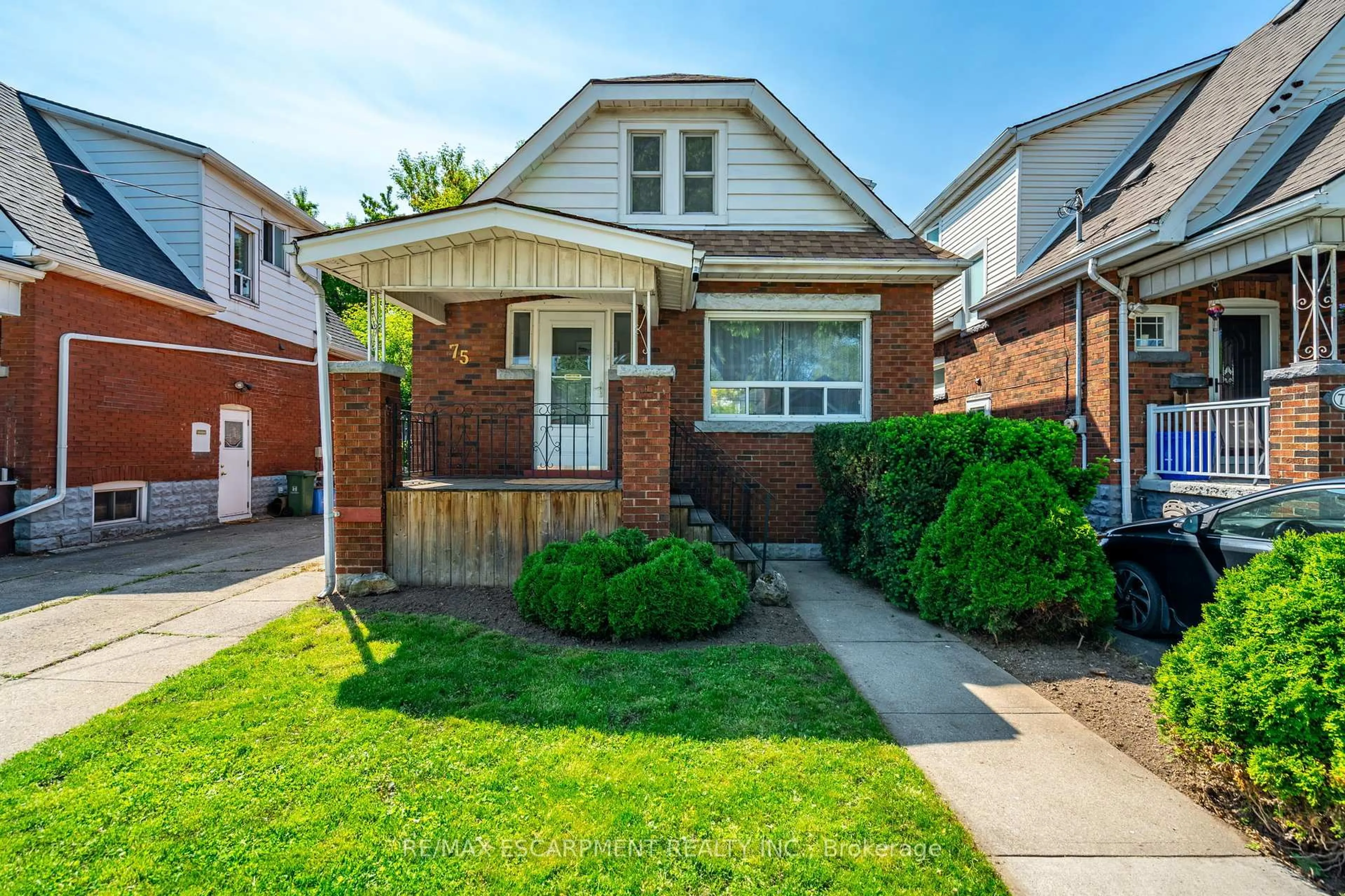Home with brick exterior material, street for 75 Barons Ave, Hamilton Ontario L8H 5A5