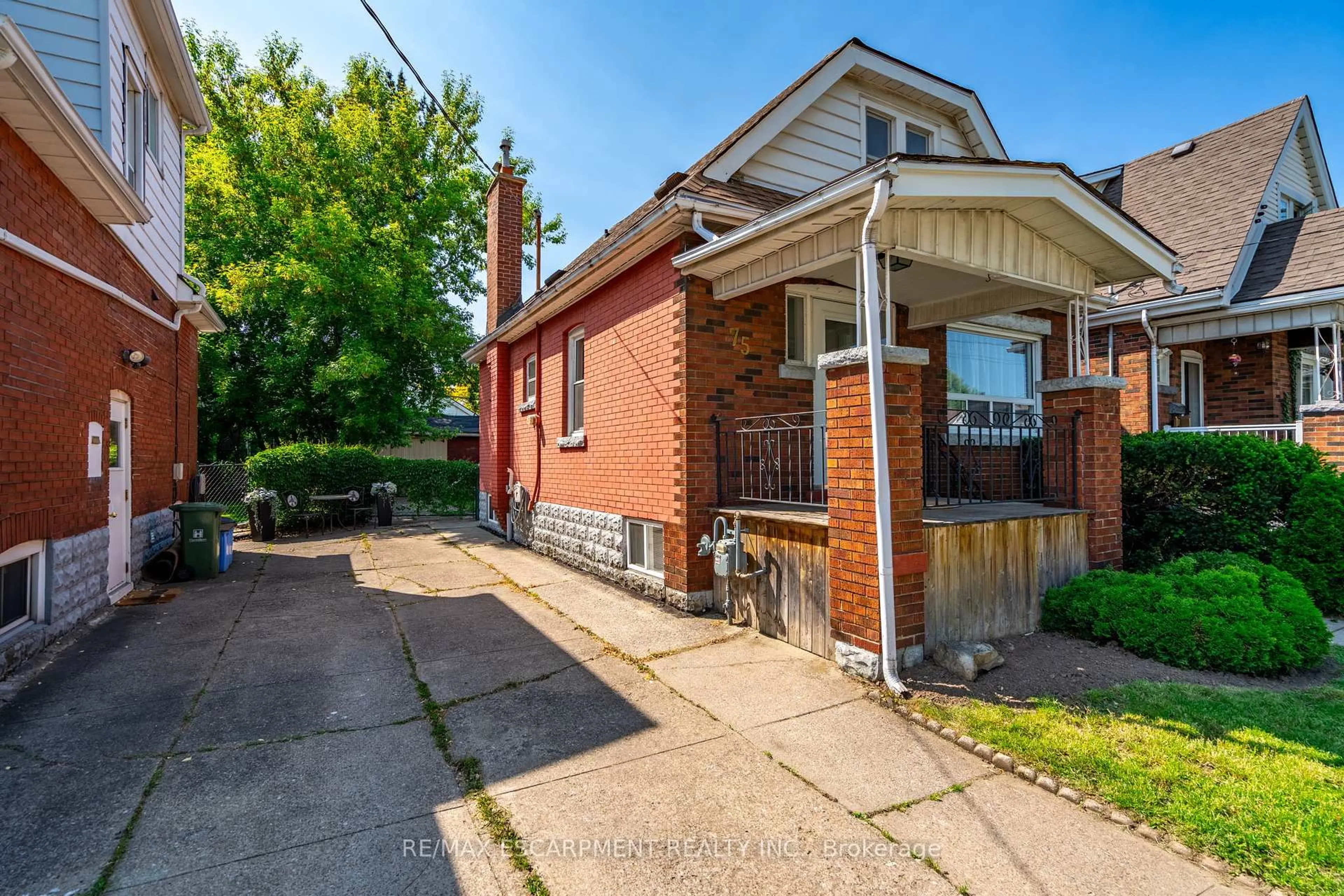 Home with brick exterior material, street for 75 Barons Ave, Hamilton Ontario L8H 5A5