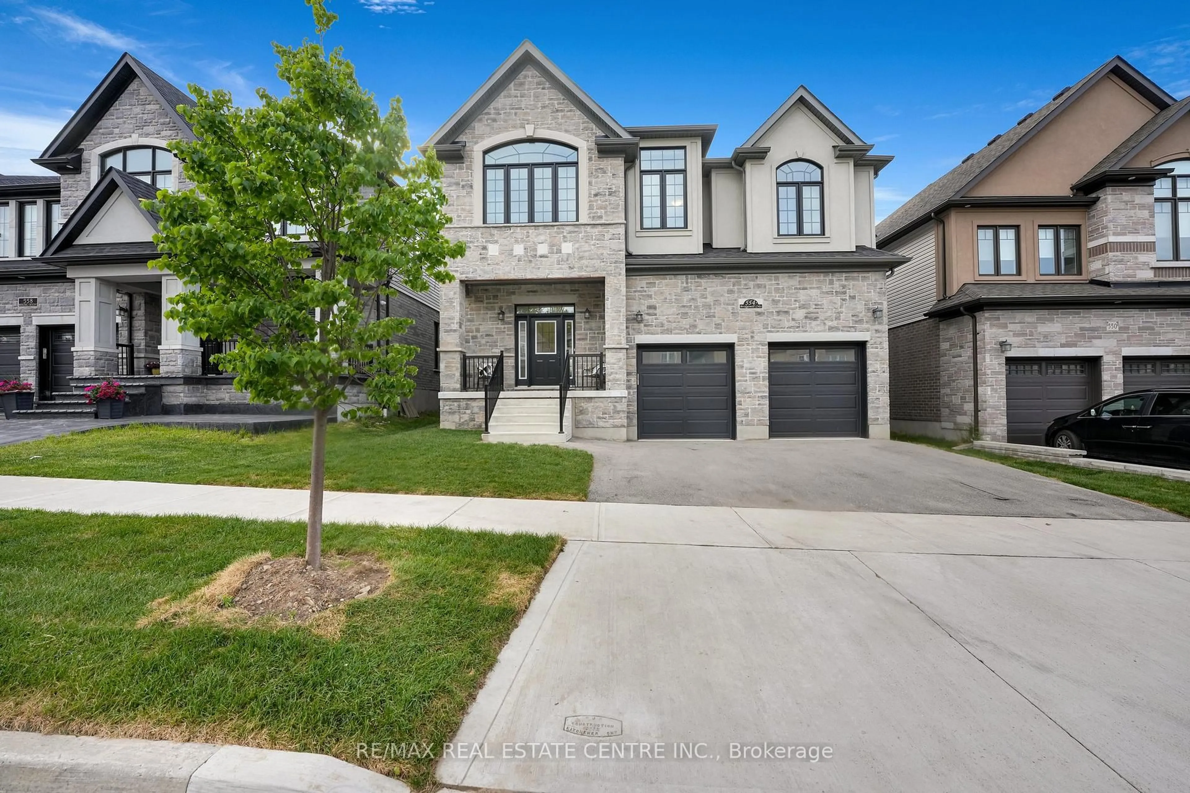 Home with brick exterior material, street for 554 Bridgemill Cres, Kitchener Ontario N2A 0K3