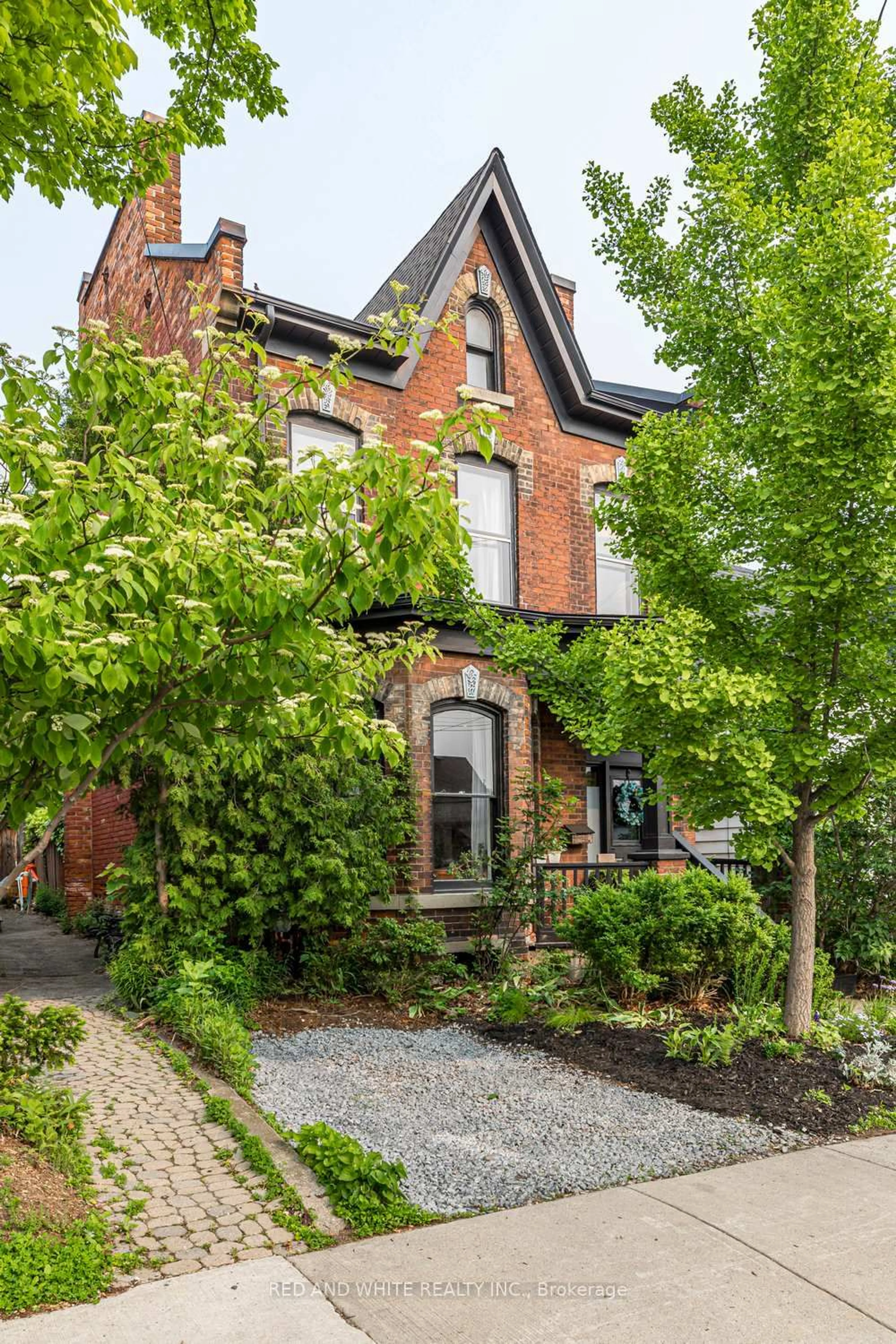 Home with brick exterior material, street for 115 Locke St, Hamilton Ontario L8R 3A7