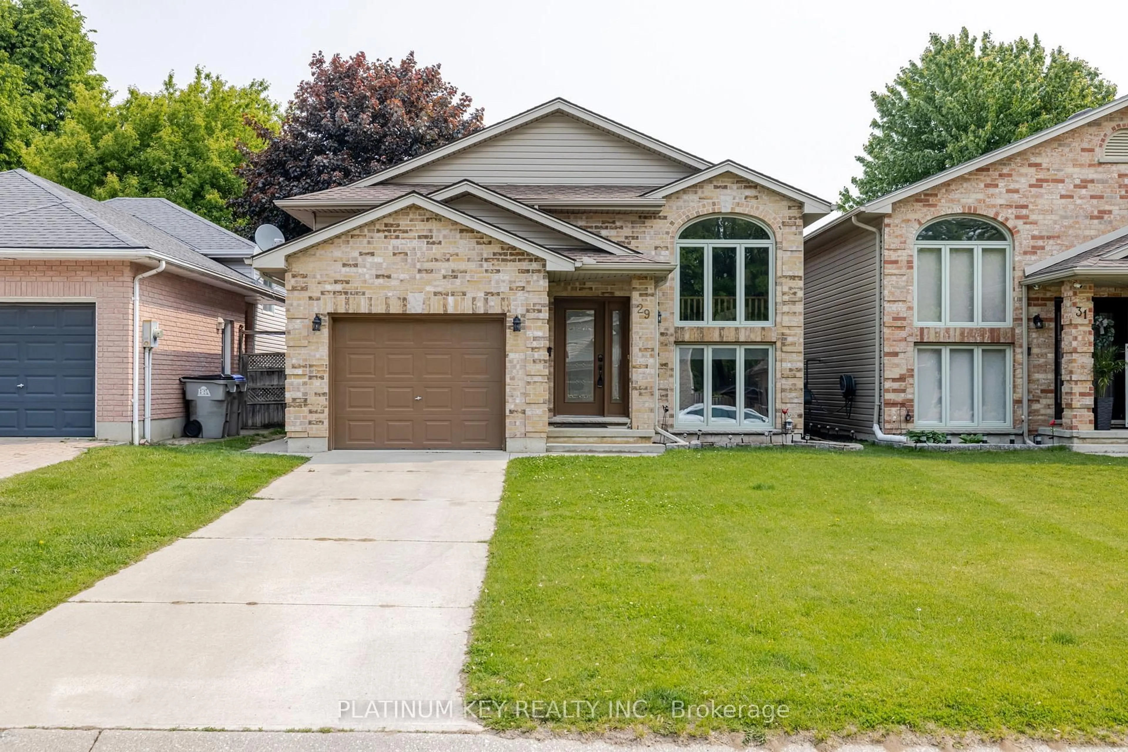 Home with brick exterior material, street for 29 Dell Dr, Strathroy-Caradoc Ontario N7G 1C6