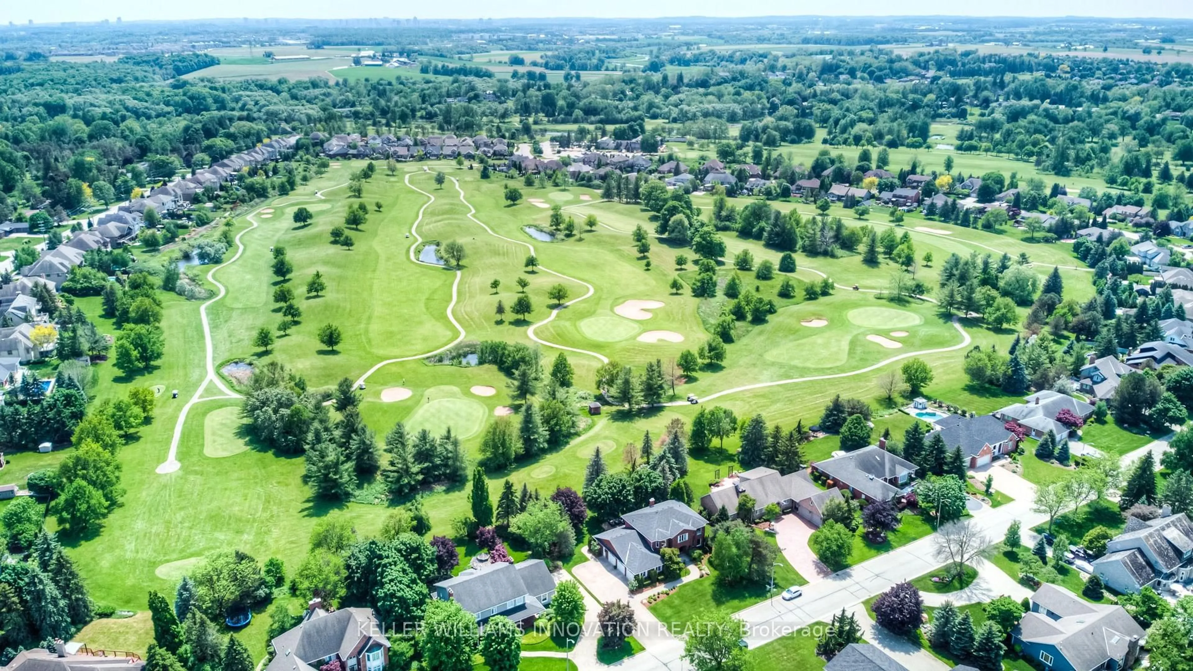 A pic from outside/outdoor area/front of a property/back of a property/a pic from drone, mountain view for 135 Golf Course Rd, Woolwich Ontario N0B 1N0