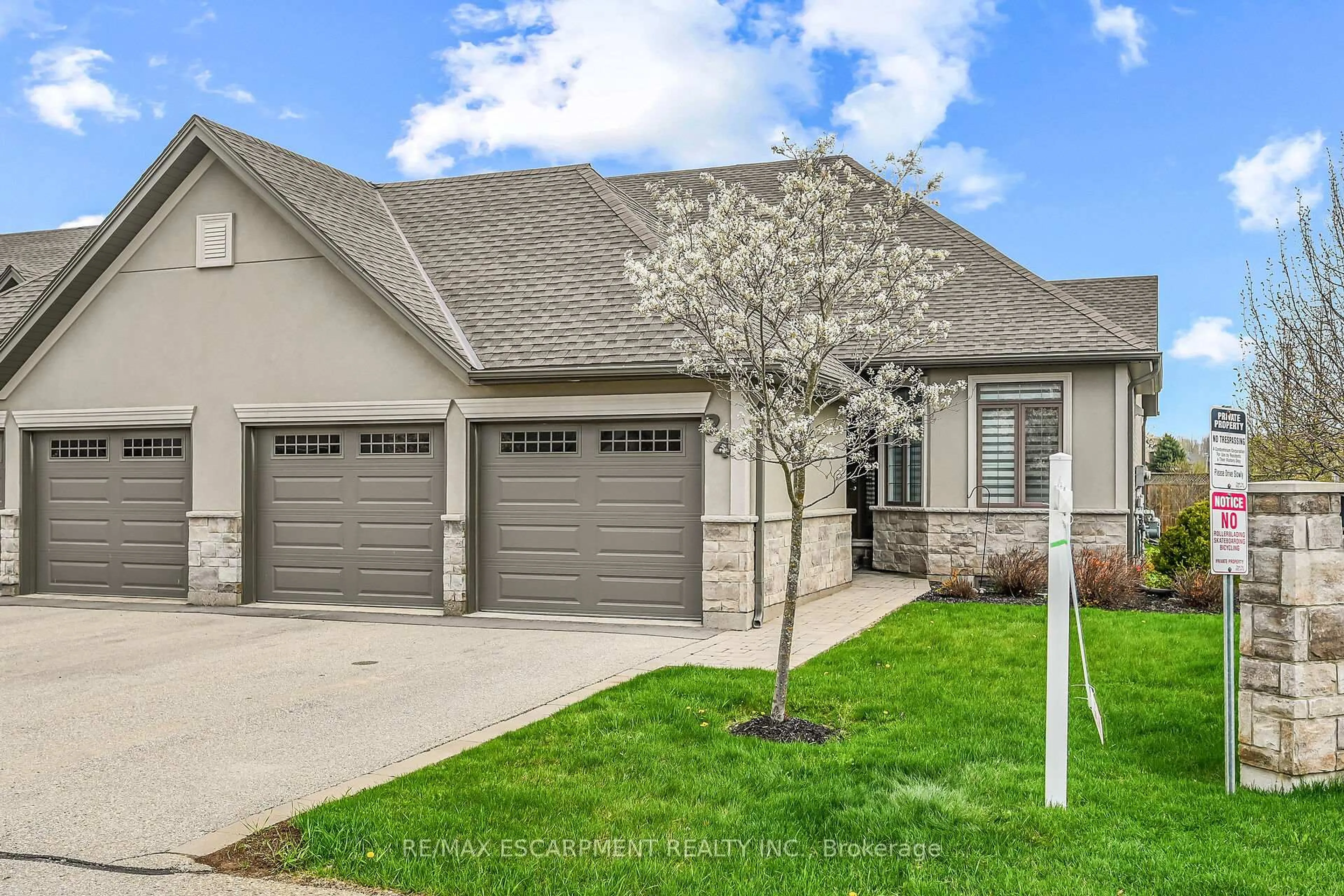Home with brick exterior material, street for 247 Munnoch Blvd #24, Woodstock Ontario N4T 0K2