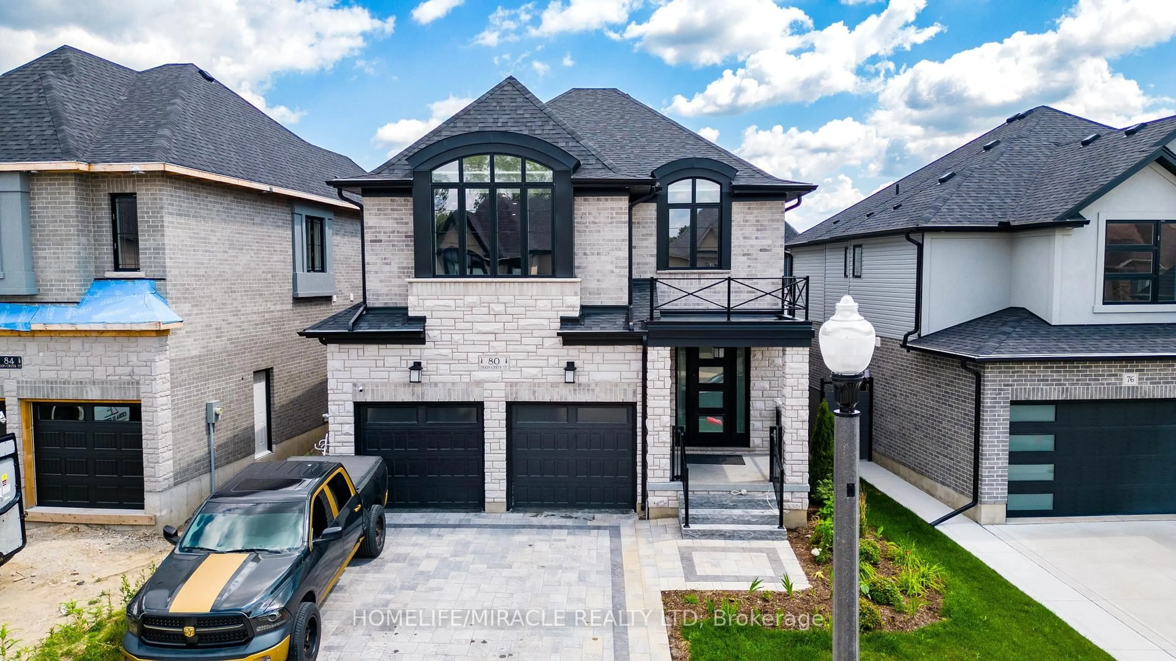 Home with brick exterior material, street for 80 Doon Creek St, Kitchener Ontario N2R 0M3