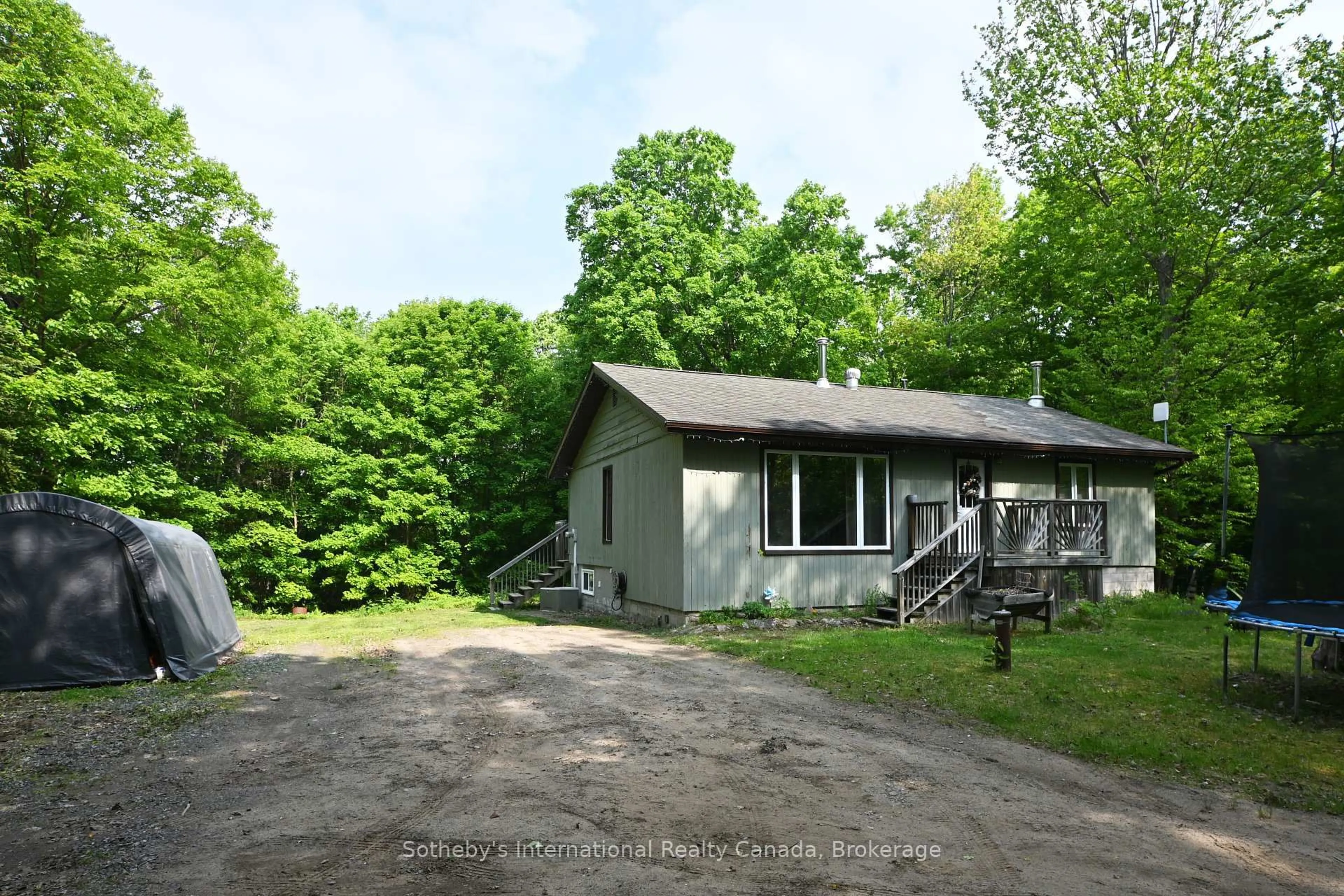 A pic from outside/outdoor area/front of a property/back of a property/a pic from drone, unknown for 48 Miller Dr, McDougall Ontario P2A 2W7