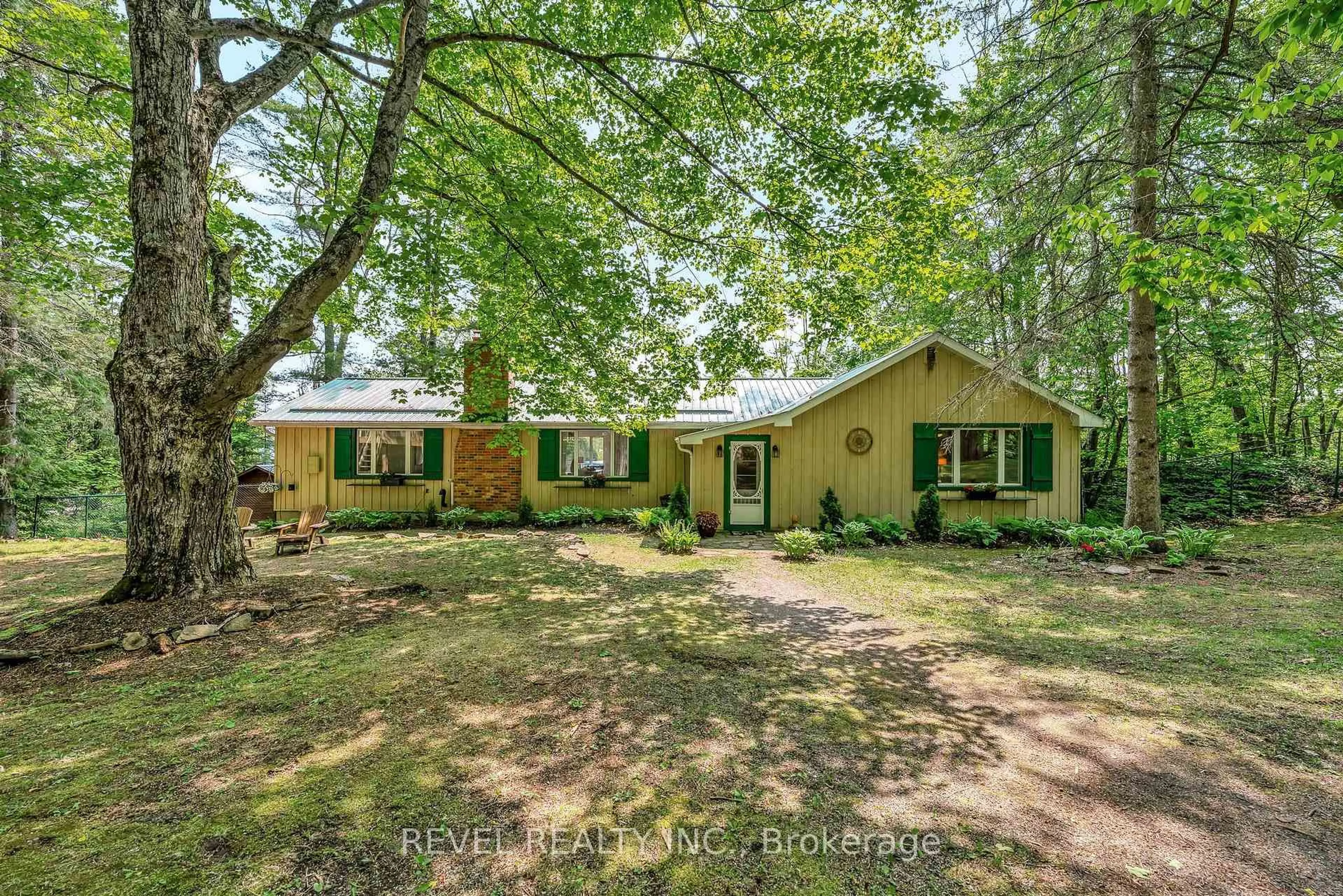 A pic from outside/outdoor area/front of a property/back of a property/a pic from drone, forest/trees view for 20 Benson Blvd, Kawartha Lakes Ontario K0M 1K0
