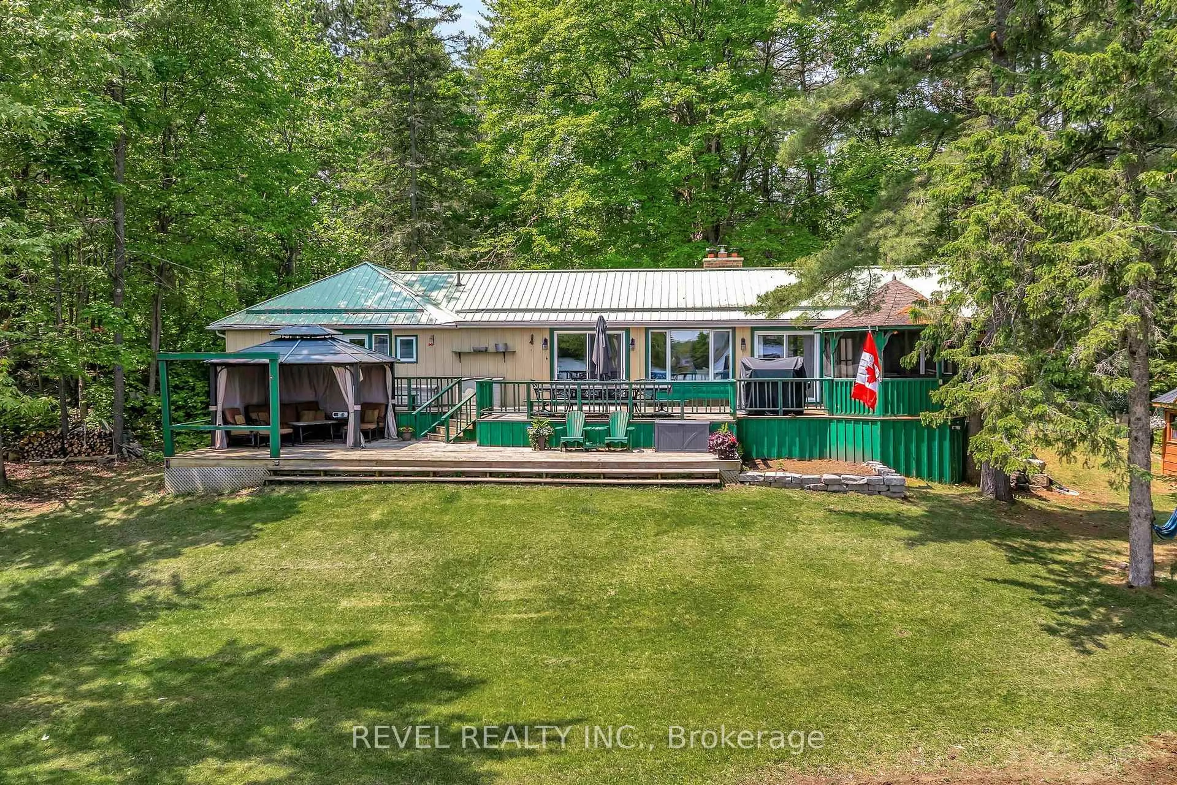 A pic from outside/outdoor area/front of a property/back of a property/a pic from drone, unknown for 20 Benson Blvd, Kawartha Lakes Ontario K0M 1K0