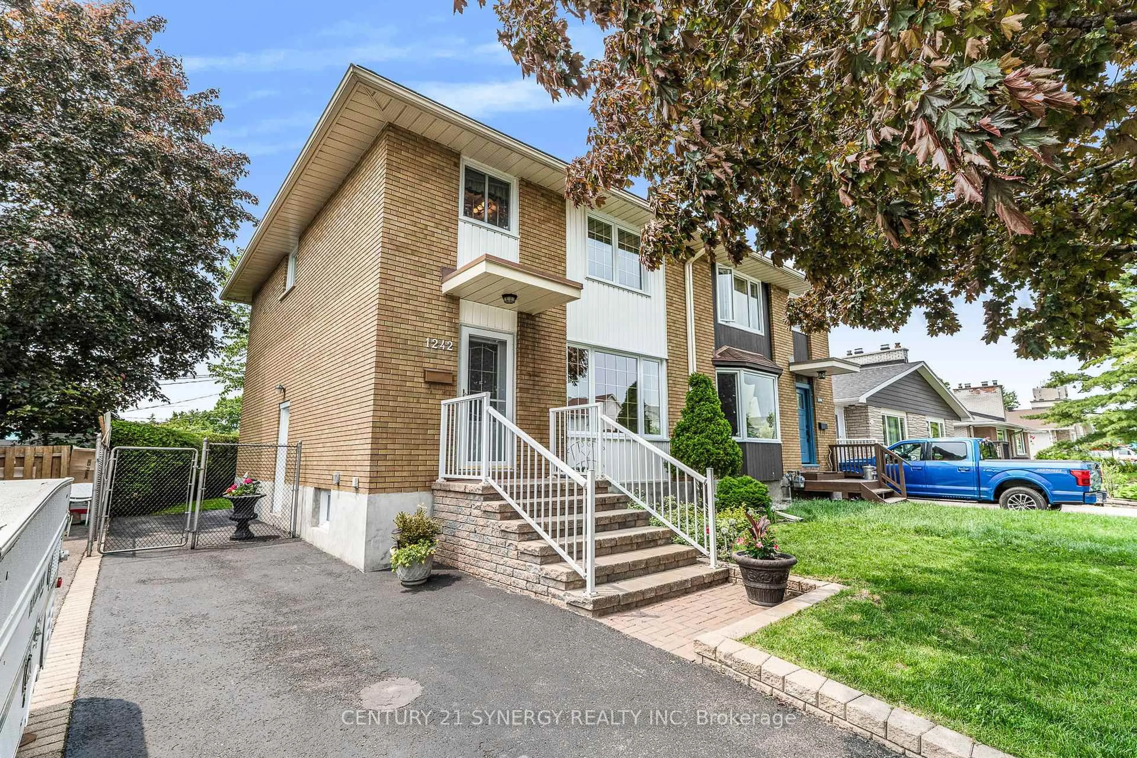 Home with brick exterior material, street for 1242 Clyde Ave, Ottawa Ontario K2C 1Y4