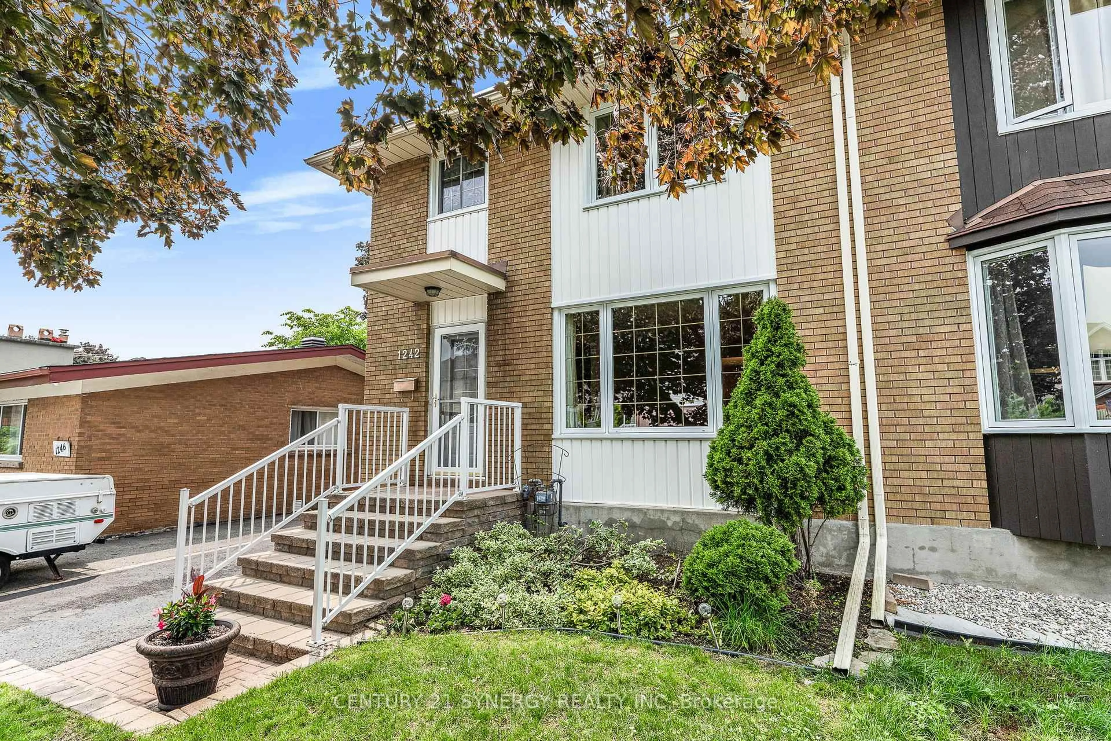 Home with brick exterior material, street for 1242 Clyde Ave, Ottawa Ontario K2C 1Y4