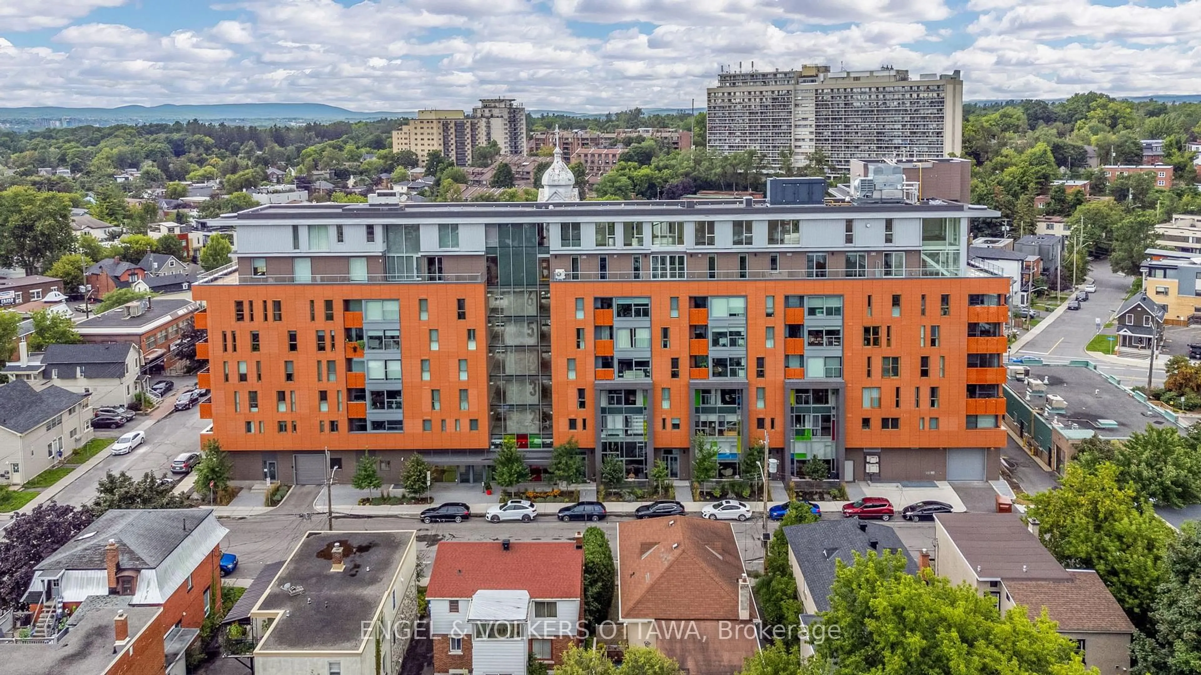 A pic from outside/outdoor area/front of a property/back of a property/a pic from drone, city buildings view from balcony for 135 Barrette St #103, Ottawa Ontario K1L 7Z9