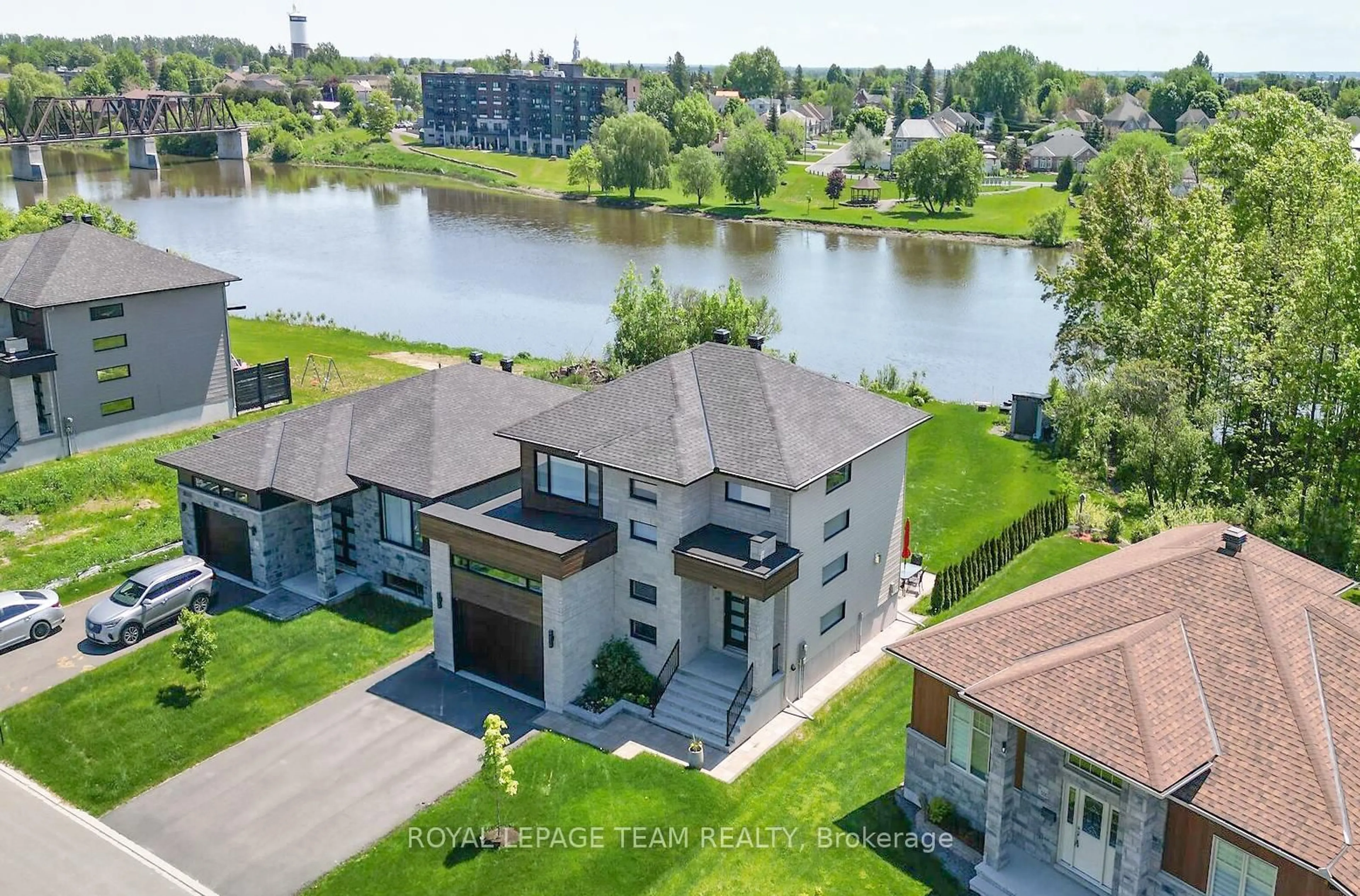 A pic from outside/outdoor area/front of a property/back of a property/a pic from drone, water/lake/river/ocean view for 504 Barrage St, Casselman Ontario K0A 1M0