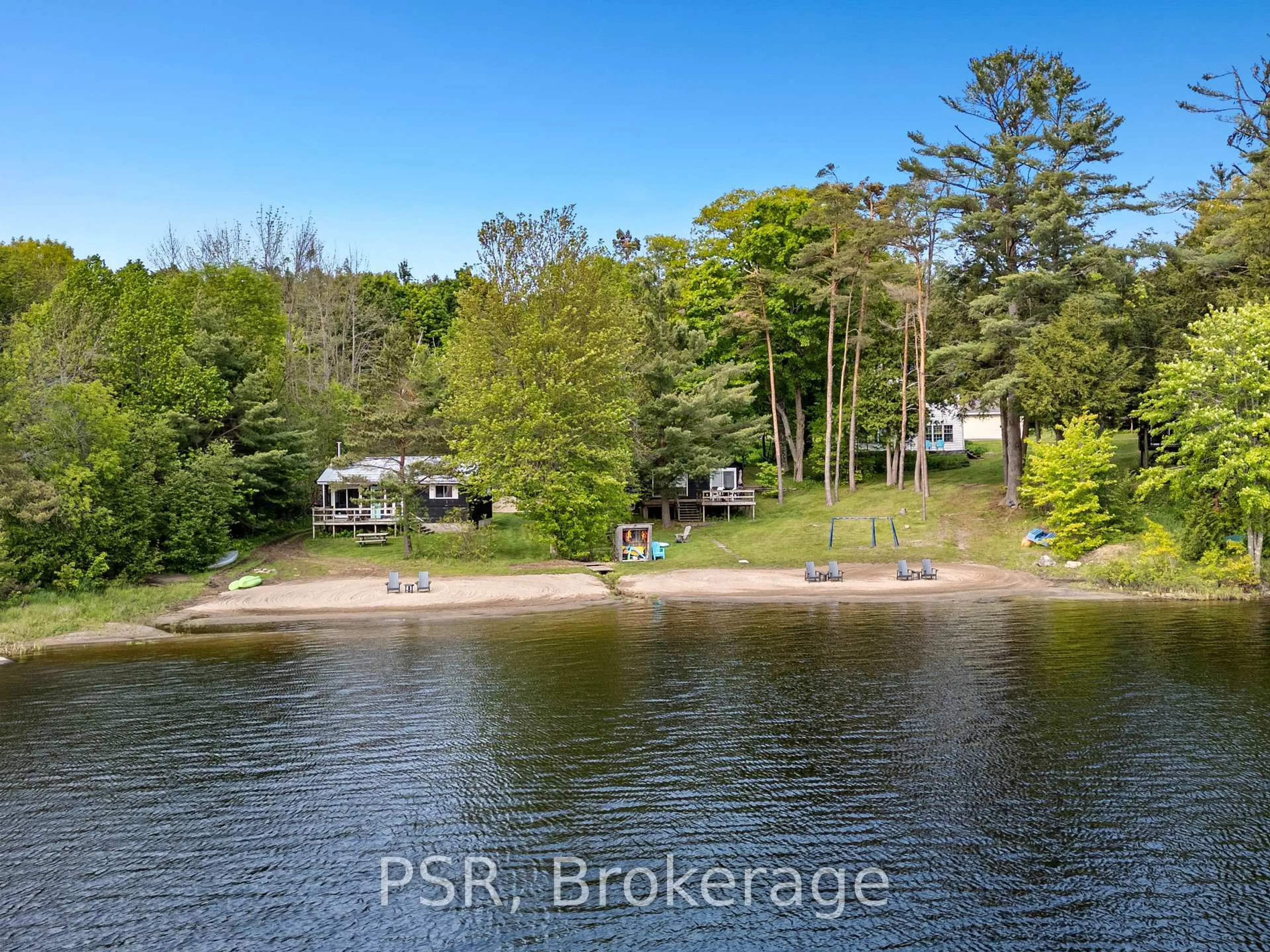 A pic from outside/outdoor area/front of a property/back of a property/a pic from drone, water/lake/river/ocean view for 1113 Moon River Rd, Muskoka Lakes Ontario P0C 1A0