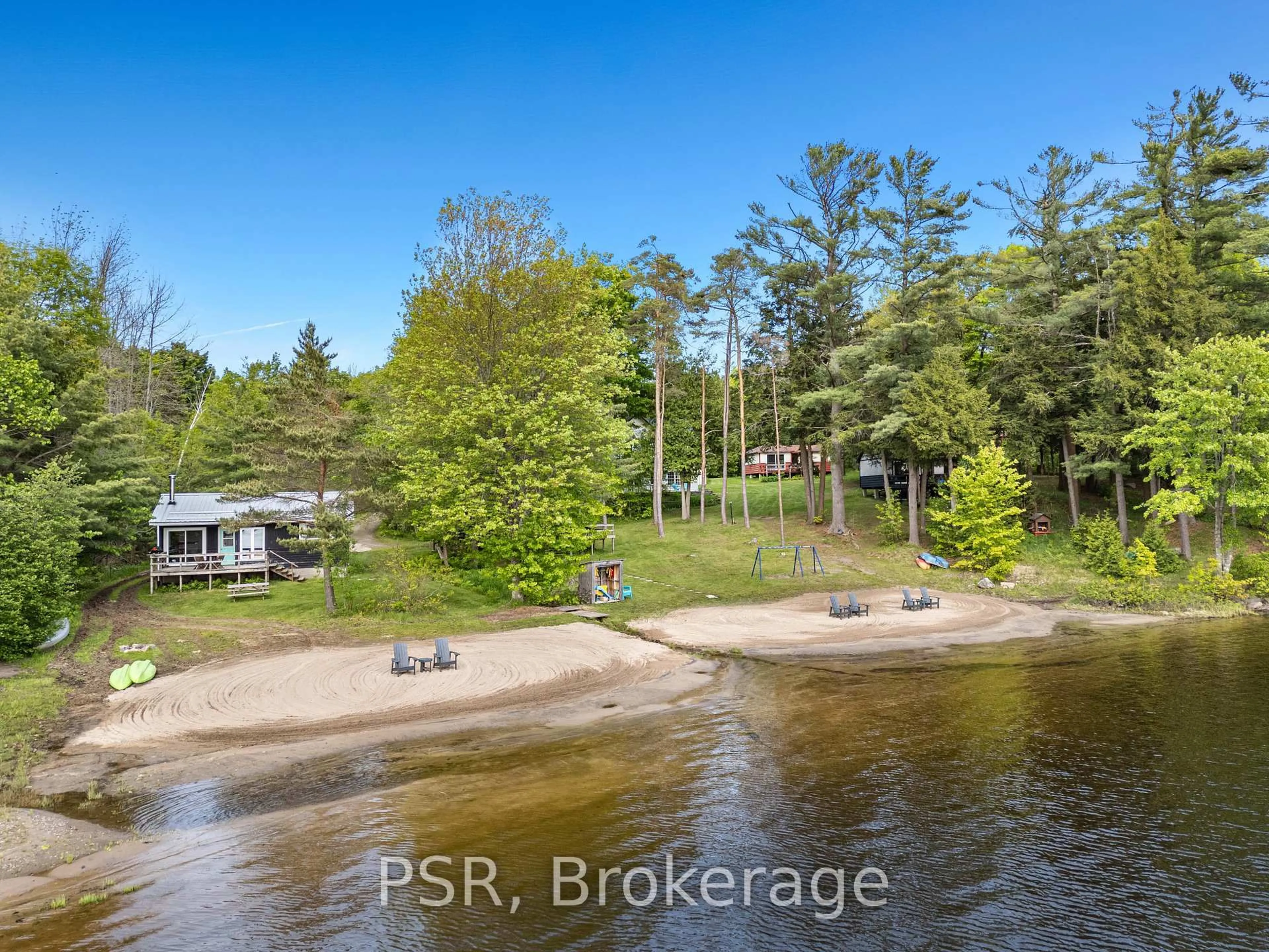 A pic from outside/outdoor area/front of a property/back of a property/a pic from drone, water/lake/river/ocean view for 1113 Moon River Rd, Muskoka Lakes Ontario P0C 1A0