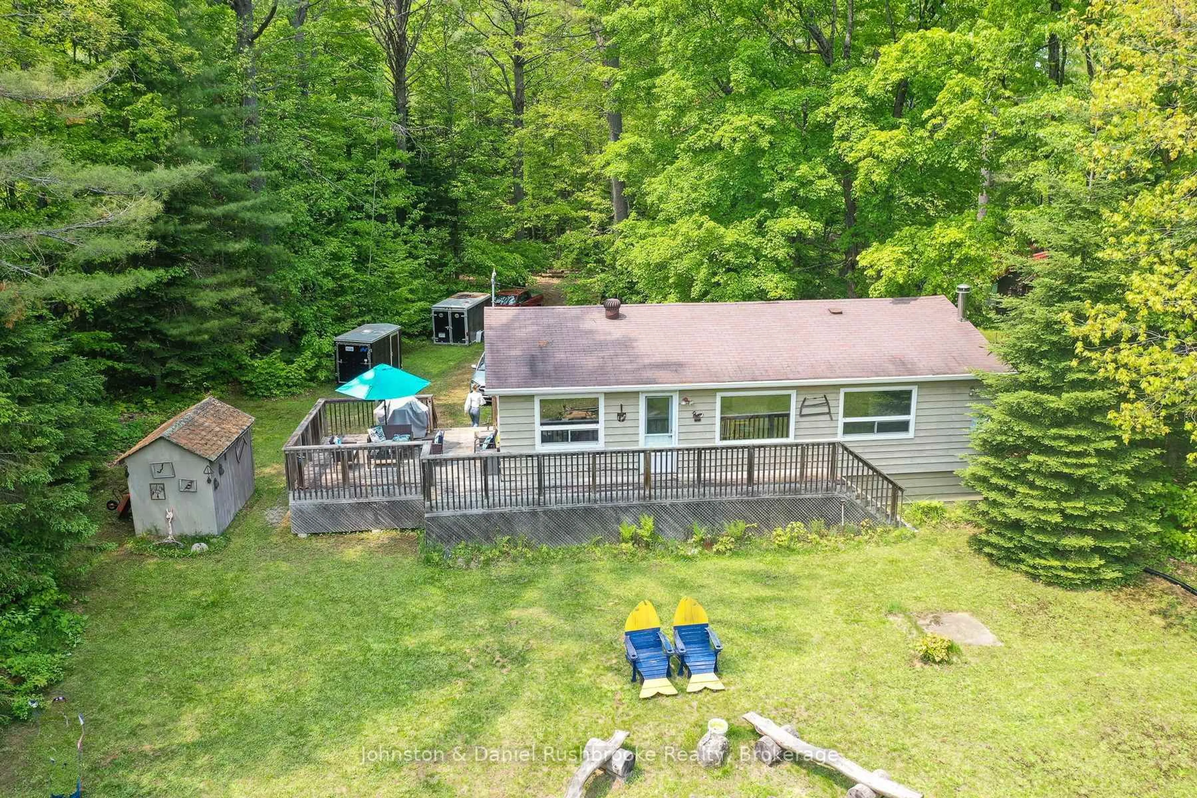 A pic from outside/outdoor area/front of a property/back of a property/a pic from drone, water/lake/river/ocean view for 1287 Sherwood Forest Rd, Bracebridge Ontario P1L 1X3
