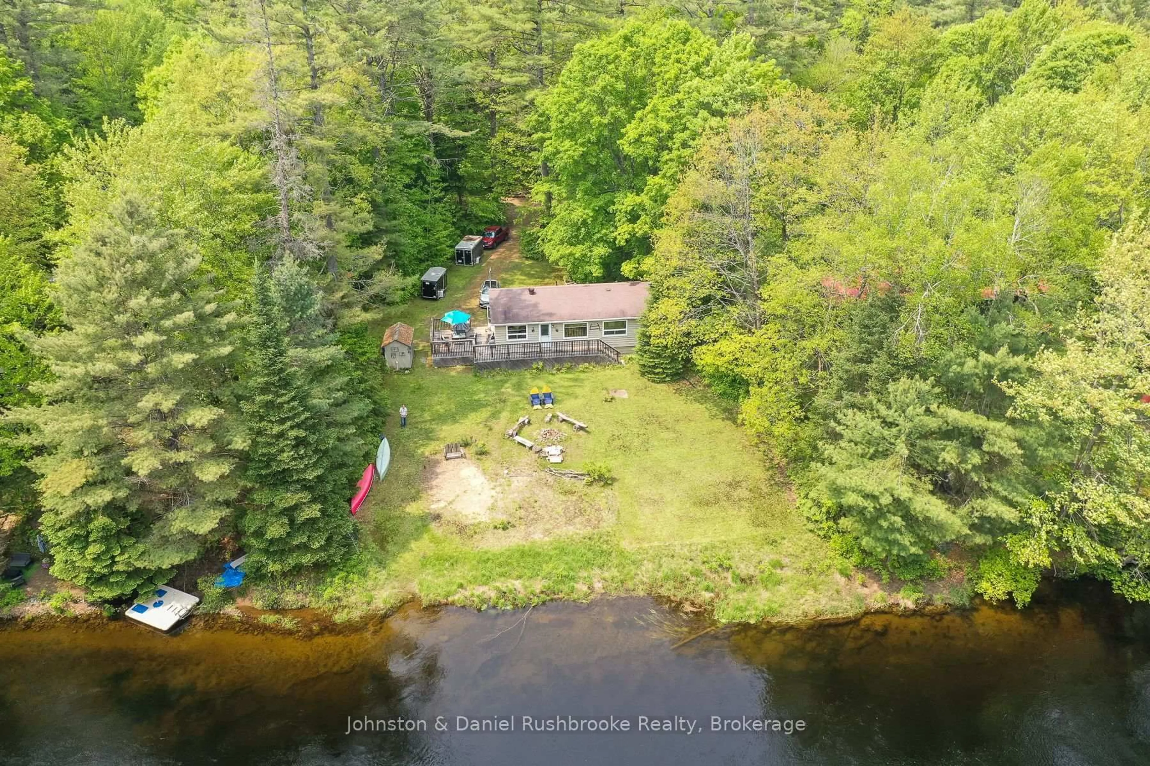 A pic from outside/outdoor area/front of a property/back of a property/a pic from drone, water/lake/river/ocean view for 1287 Sherwood Forest Rd, Bracebridge Ontario P1L 1X3