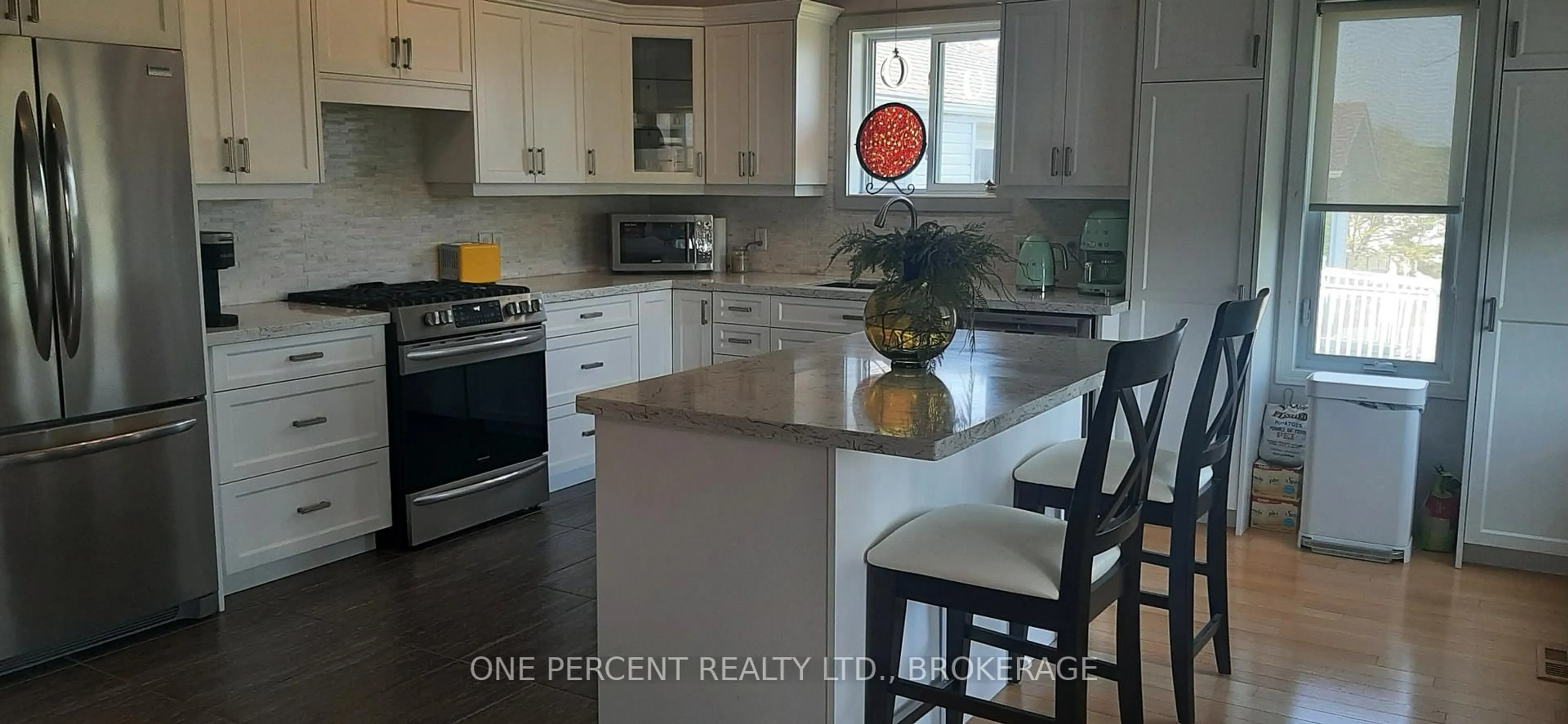Open concept kitchen, ceramic/tile floor for 441 Dolshire St, Kingston Ontario K7M 9B5