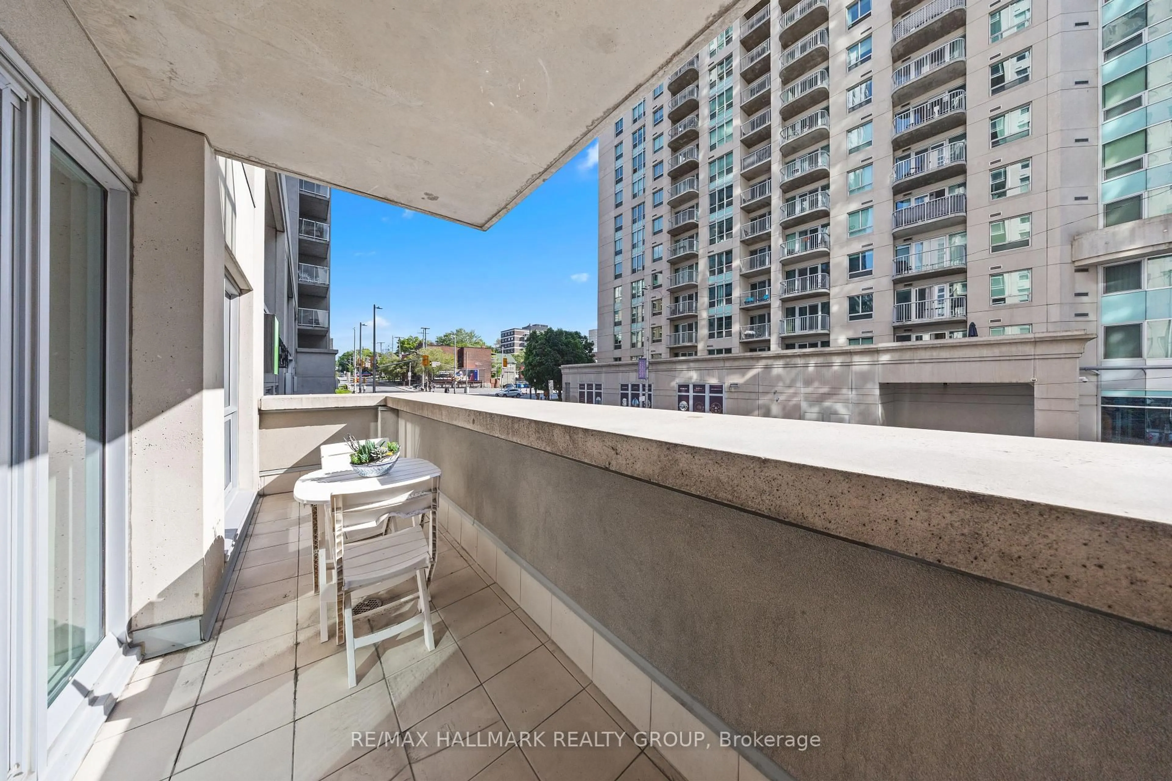 Balcony in the apartment, city buildings view from balcony for 242 Rideau St #206, Ottawa Ontario K1N 0B7