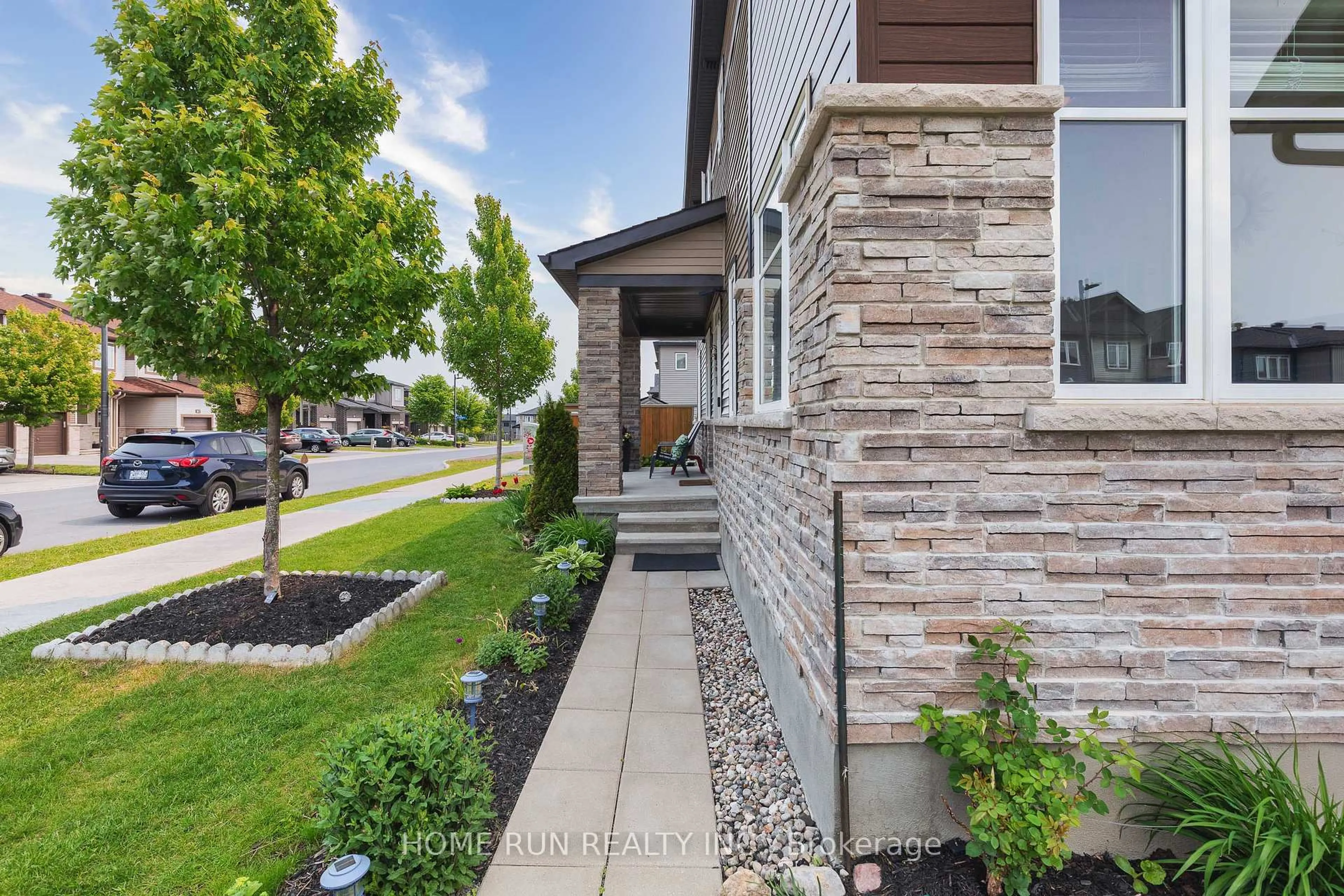 Home with brick exterior material, street for 156 Bending Way, Ottawa Ontario K2J 6N9