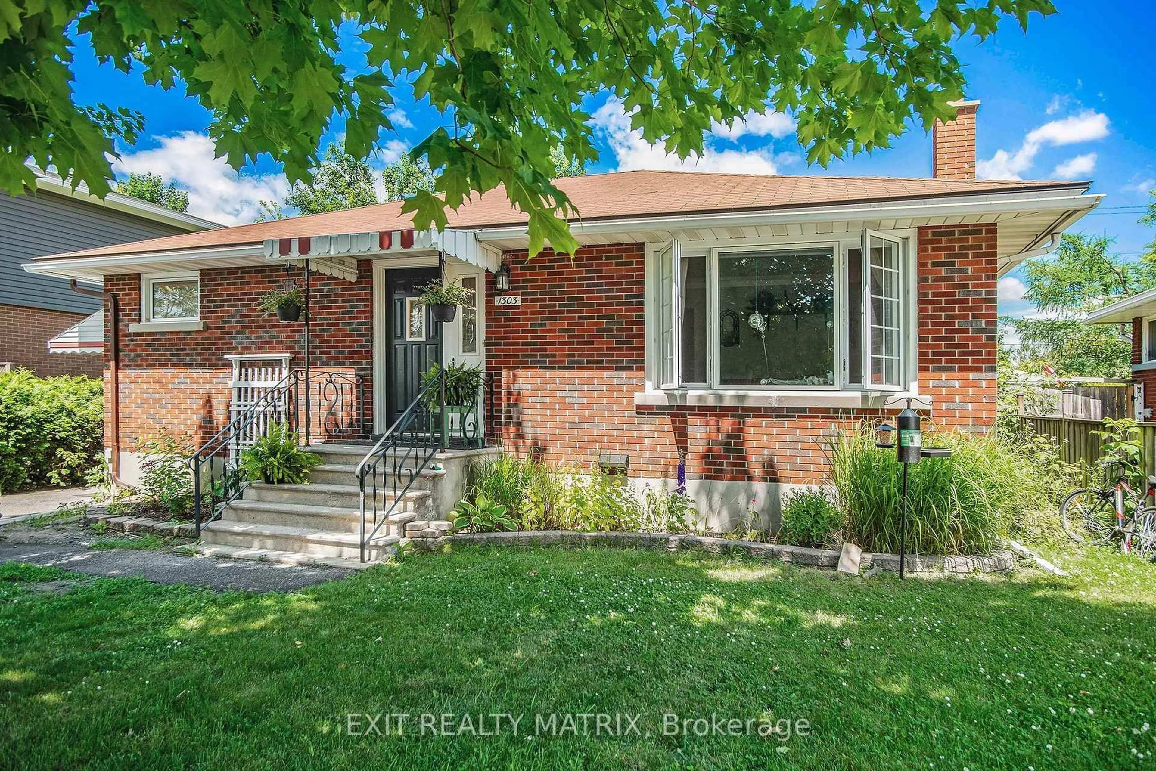 Home with brick exterior material, street for 1303 Vancouver Ave, Ottawa Ontario K1V 6T8