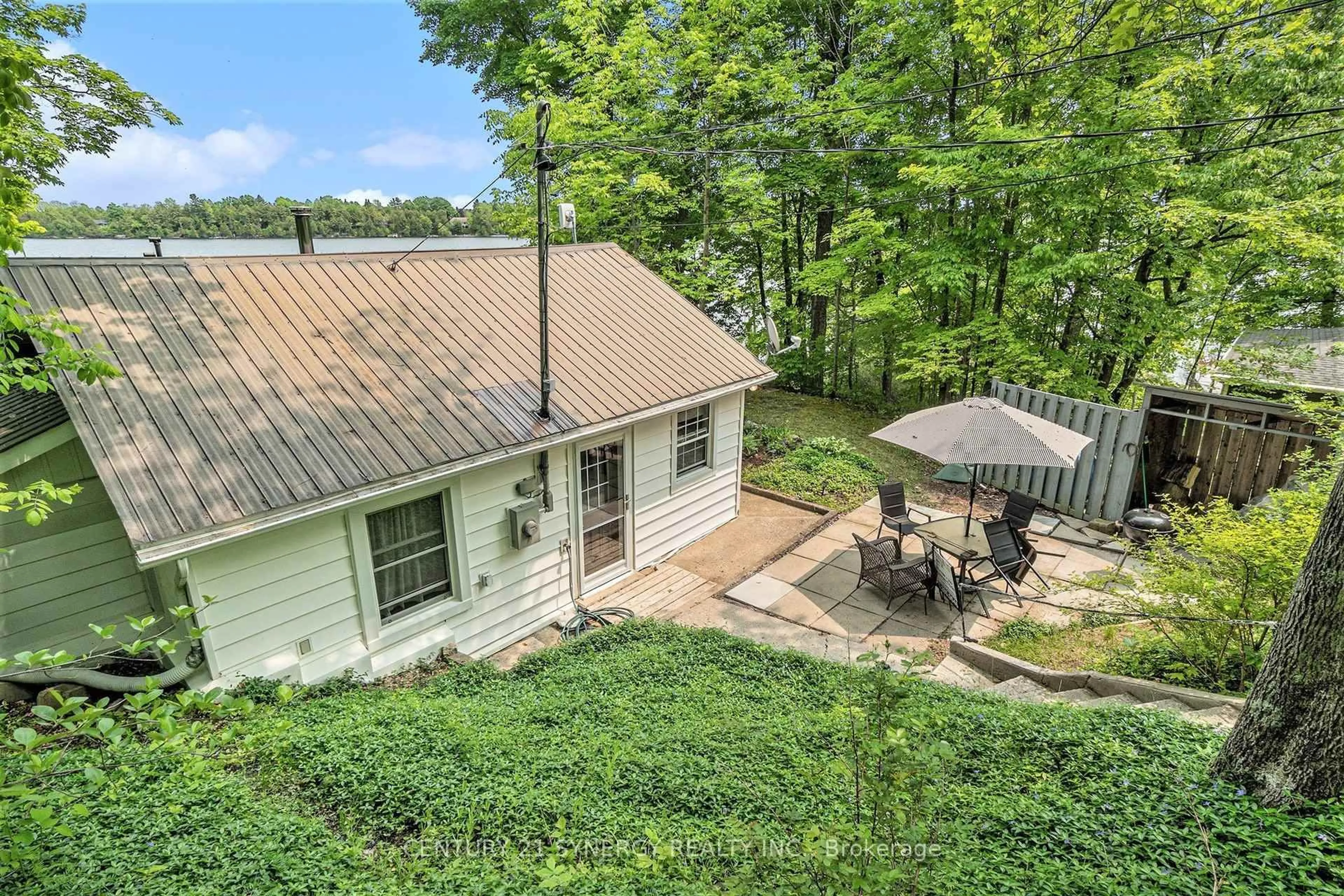A pic from outside/outdoor area/front of a property/back of a property/a pic from drone, water/lake/river/ocean view for 29 O3 Rd, Rideau Lakes Ontario K0G 1L0