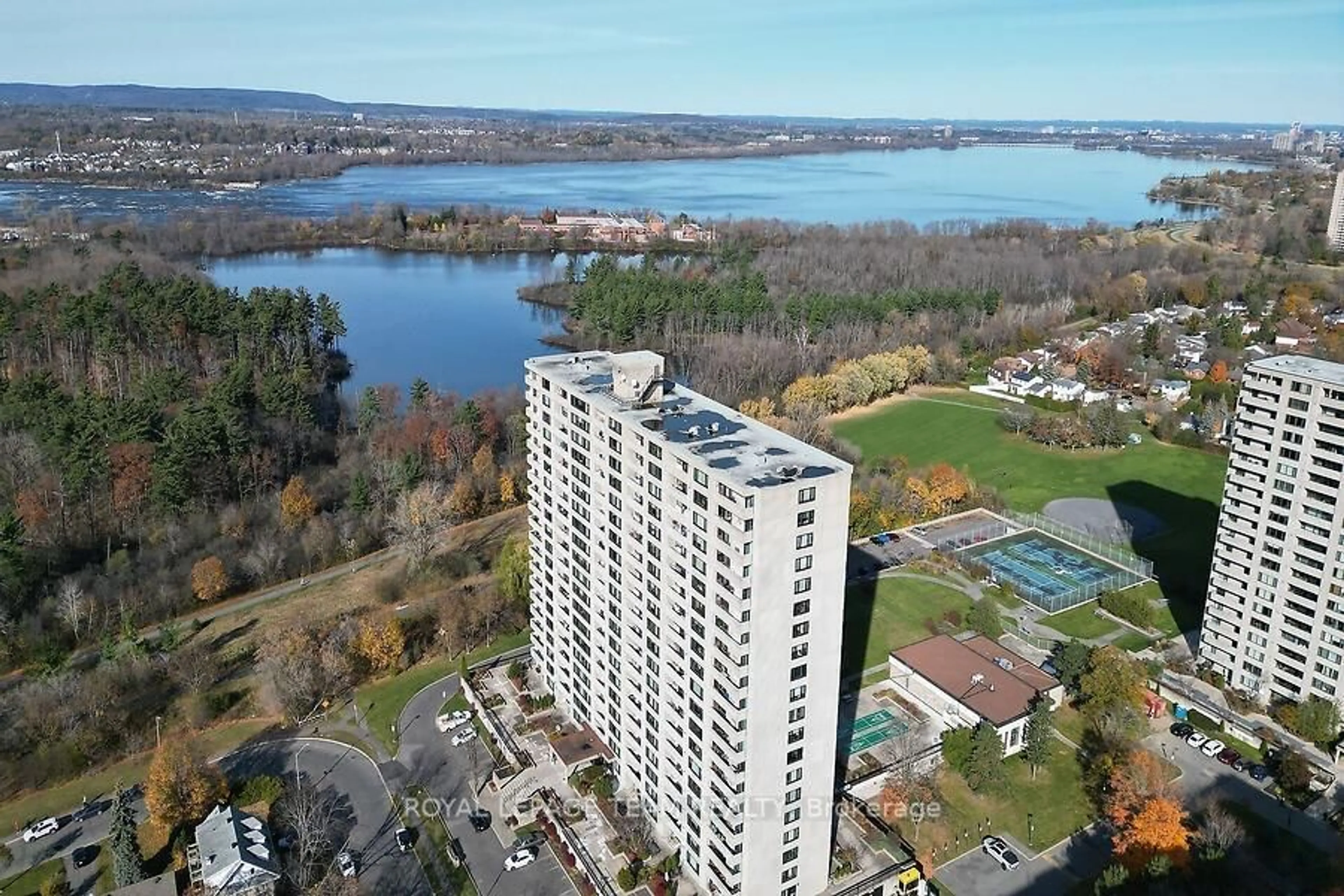 A pic from outside/outdoor area/front of a property/back of a property/a pic from drone, water/lake/river/ocean view for 265 Poulin Ave #805, Ottawa Ontario K2B 7Y8